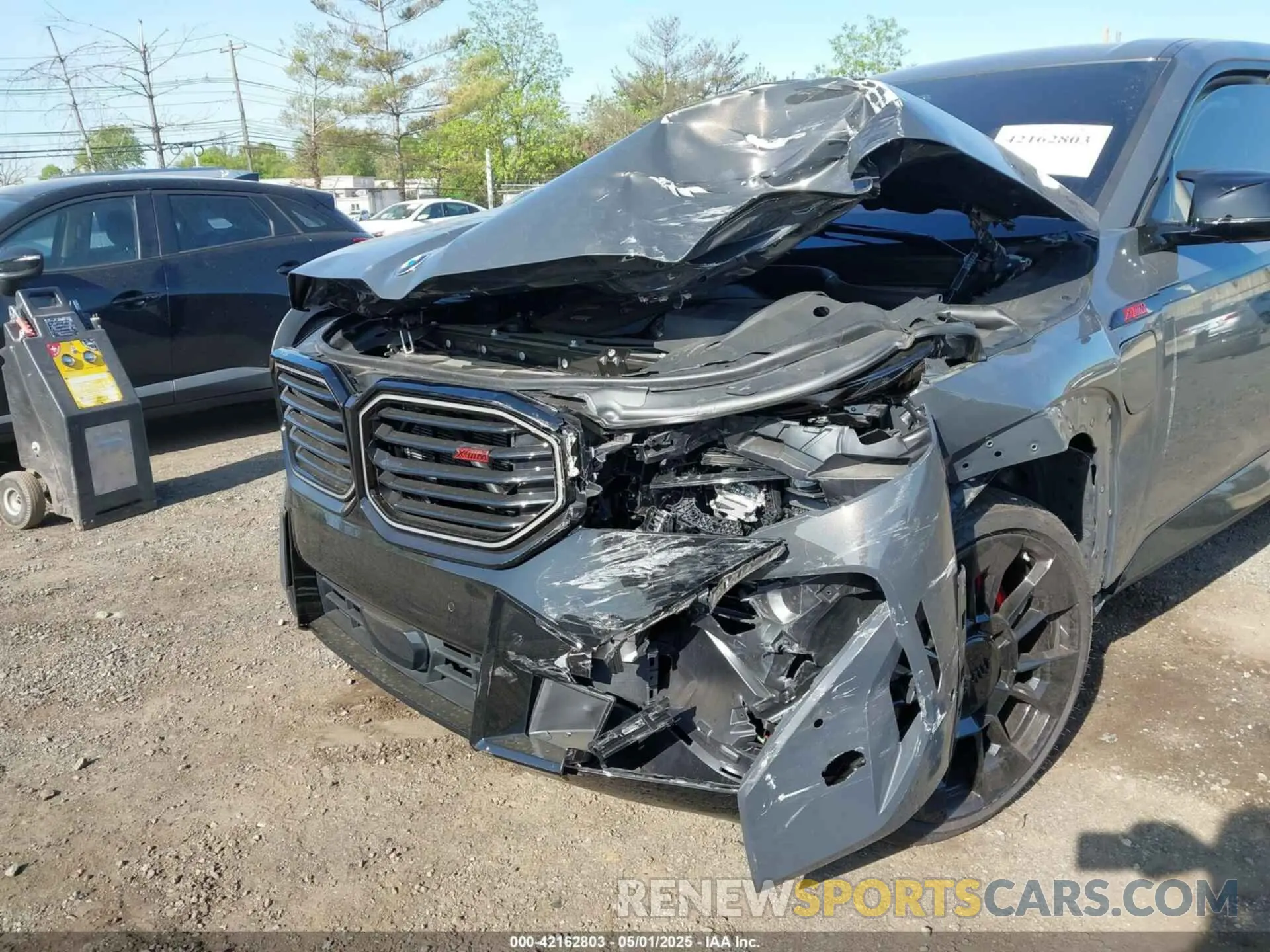 6 Photograph of a damaged car 5YM33CS09S9Y23728 BMW XM 2025