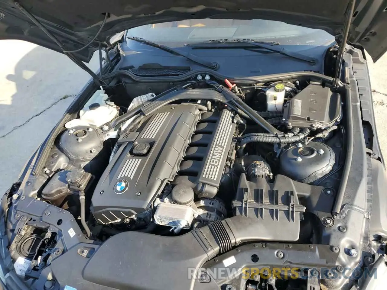 11 Photograph of a damaged car WBALM5C59BE378391 BMW Z4 2011