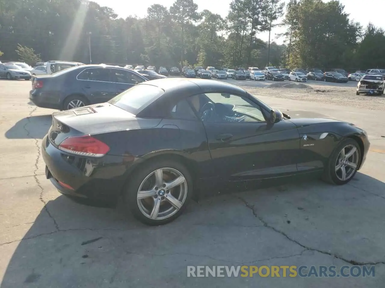 3 Photograph of a damaged car WBALM5C59BE378391 BMW Z4 2011