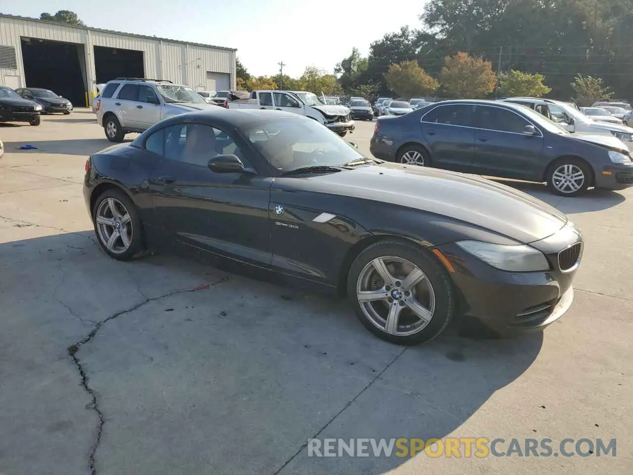 4 Photograph of a damaged car WBALM5C59BE378391 BMW Z4 2011