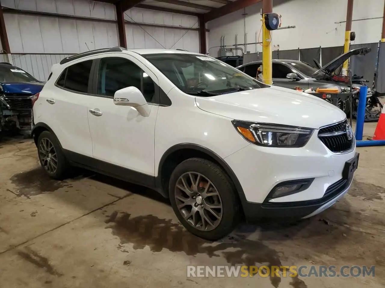 4 Photograph of a damaged car KL4CJ2SM7KB701187 BUICK ENCORE 2019