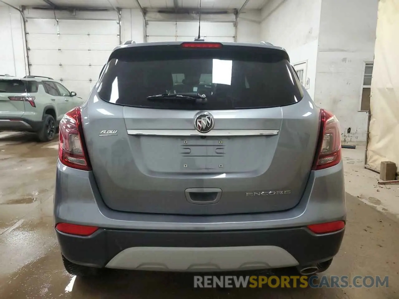 6 Photograph of a damaged car KL4CJASB2KB785508 BUICK ENCORE 2019