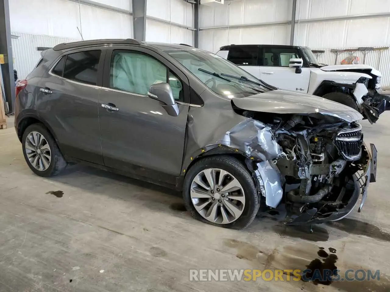 4 Photograph of a damaged car KL4CJASB4KB732700 BUICK ENCORE 2019