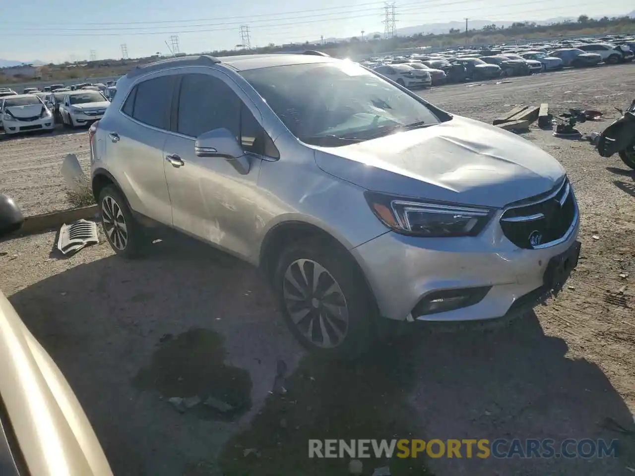 4 Photograph of a damaged car KL4CJCSM7KB809976 BUICK ENCORE 2019