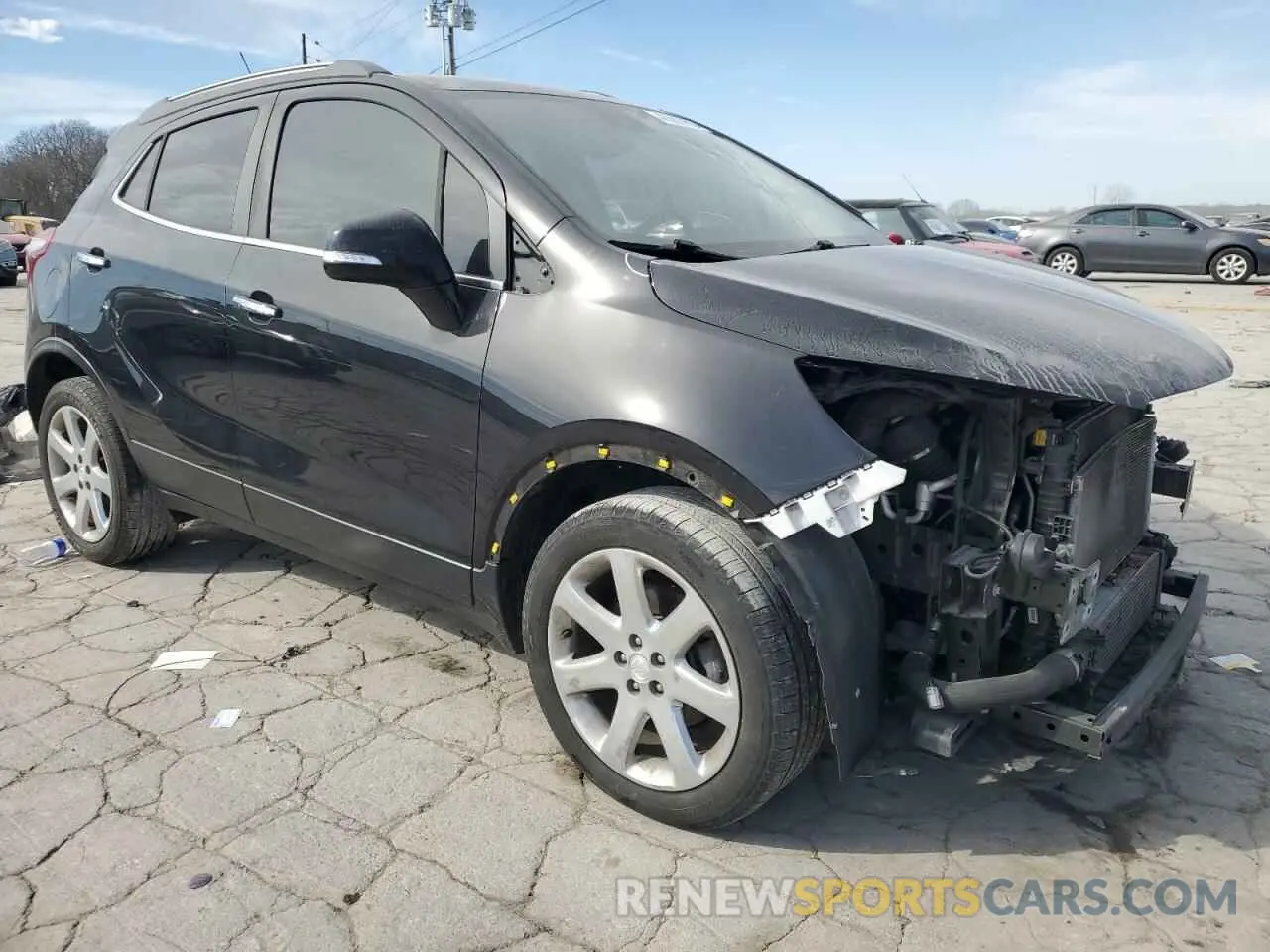 4 Photograph of a damaged car KL4CJCSMXKB751815 BUICK ENCORE 2019