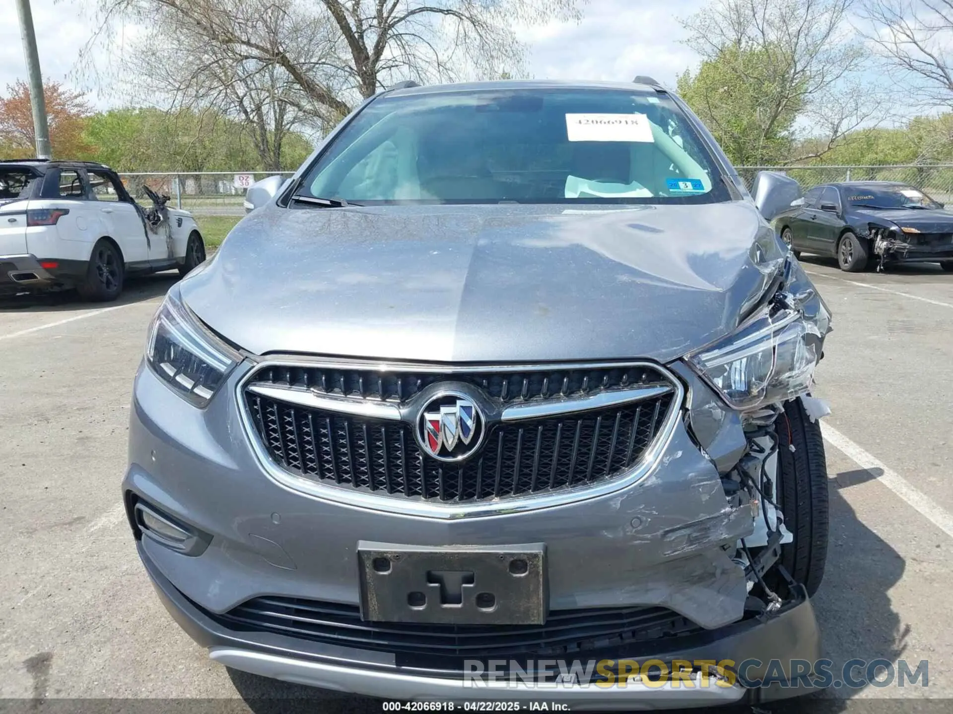 12 Photograph of a damaged car KL4CJCSMXKB940285 BUICK ENCORE 2019