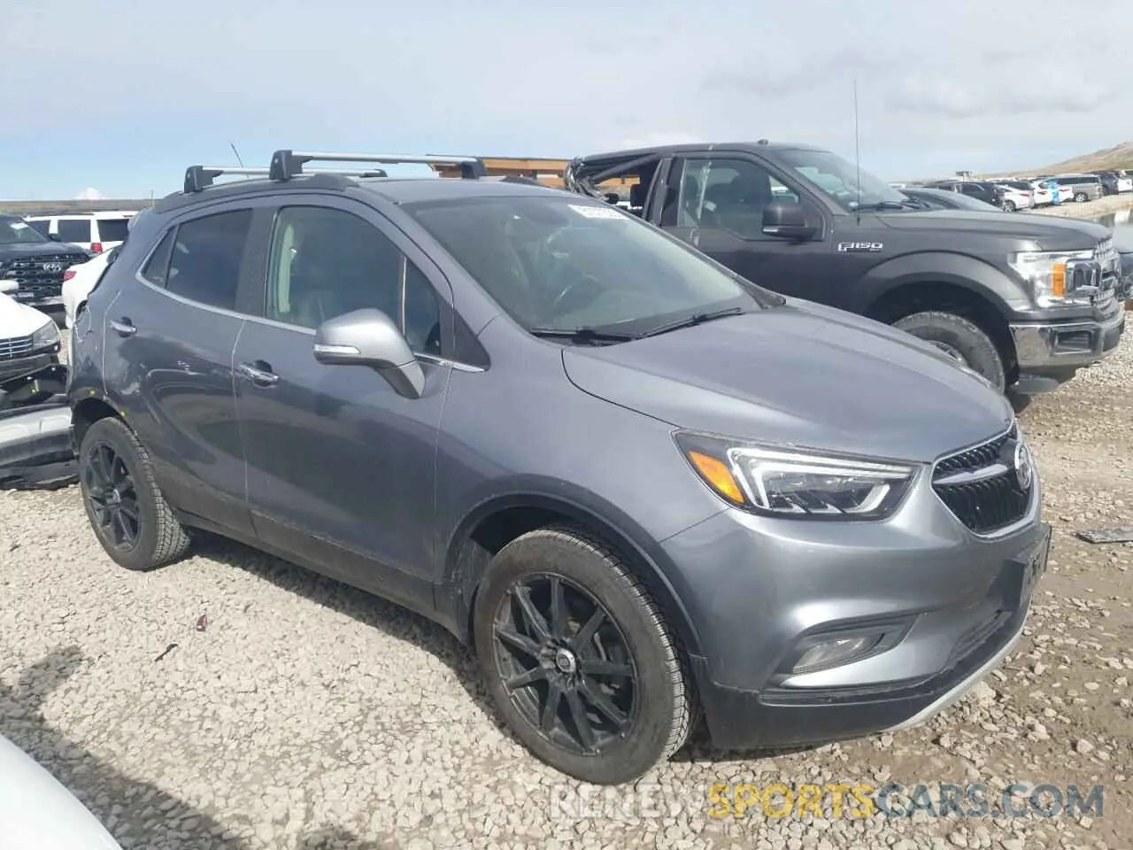 4 Photograph of a damaged car KL4CJGSM3KB867381 BUICK ENCORE 2019