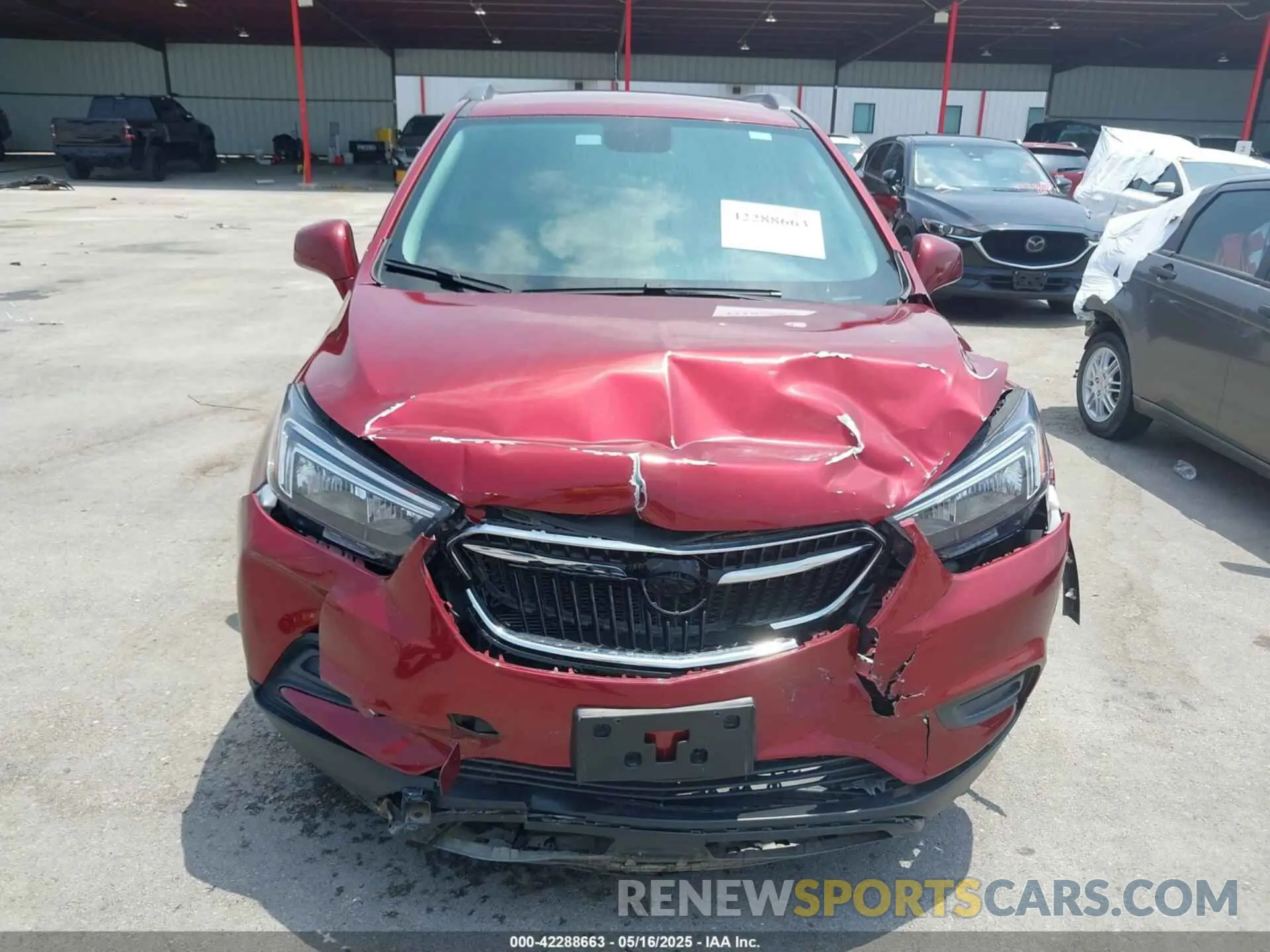 12 Photograph of a damaged car KL4CJESM0MB374359 BUICK ENCORE 2021