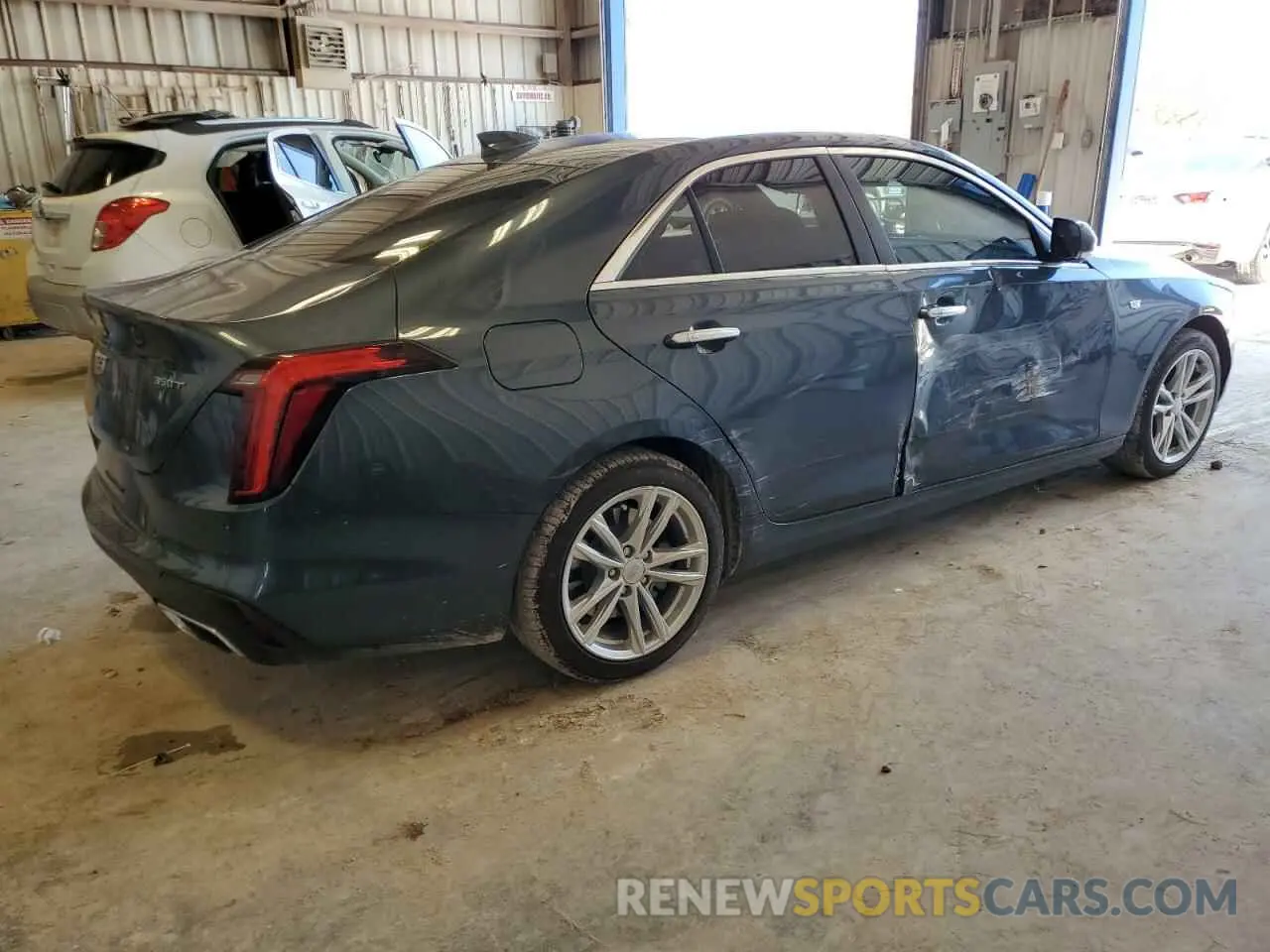 3 Photograph of a damaged car 1G6DJ5RK3N0113628 CADILLAC CT4 2022