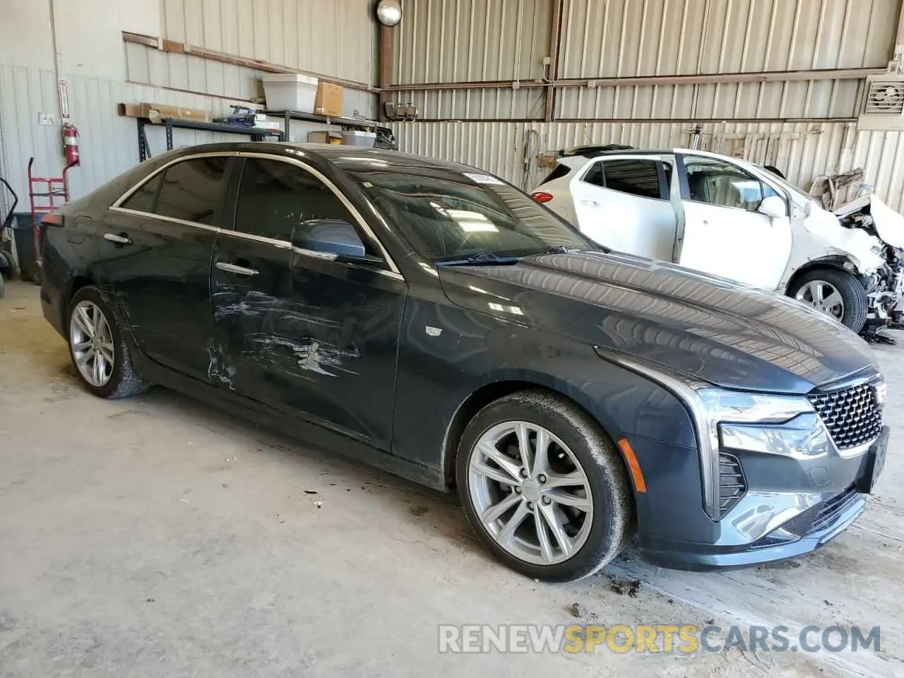 4 Photograph of a damaged car 1G6DJ5RK3N0113628 CADILLAC CT4 2022