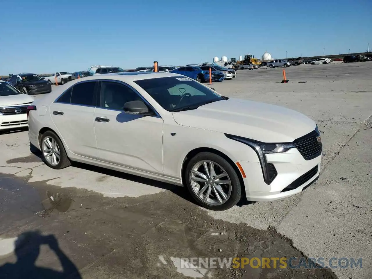 4 Photograph of a damaged car 1G6DJ5RK4P0143238 CADILLAC CT4 2023