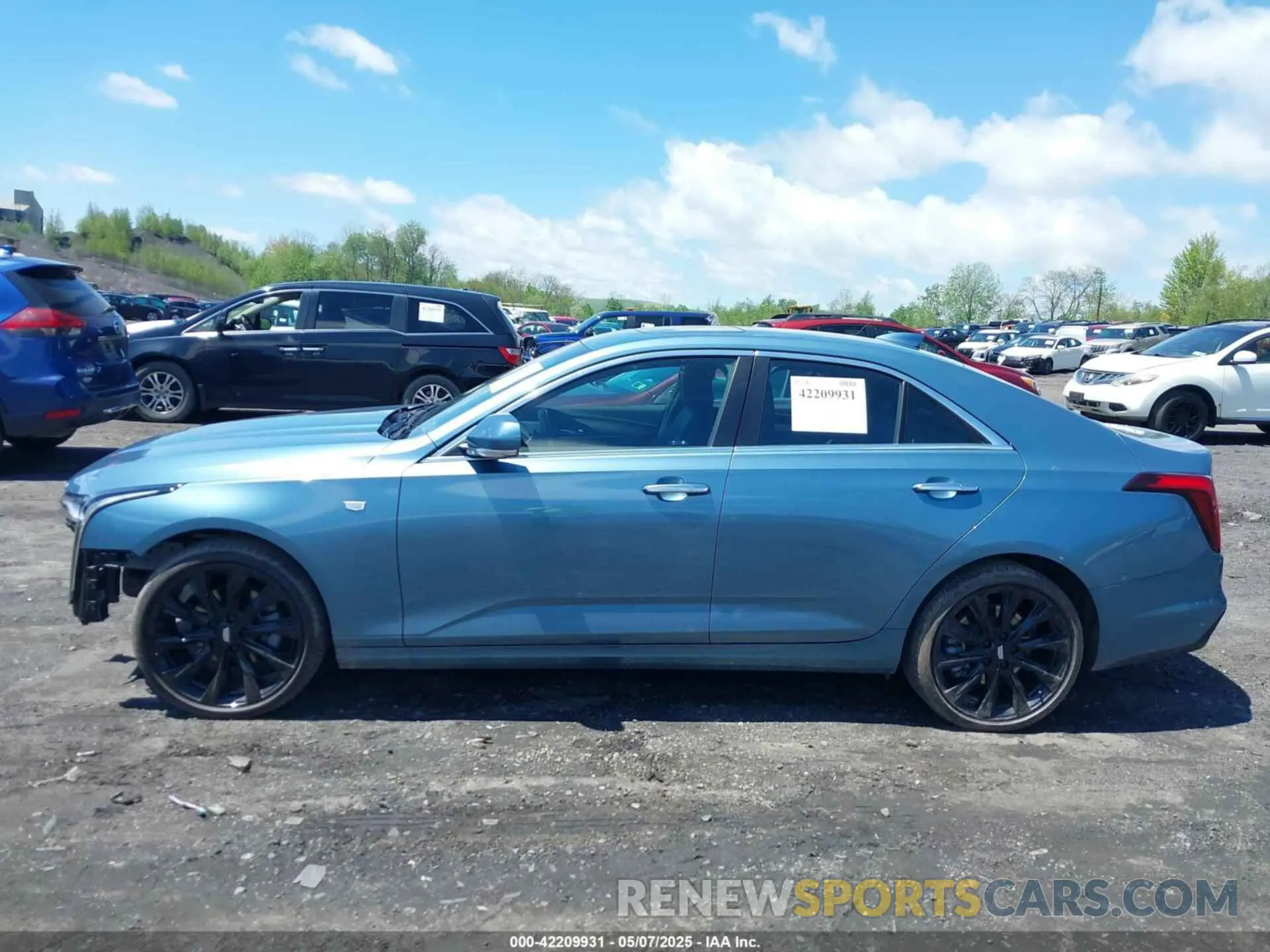 14 Photograph of a damaged car 1G6DK5RK8P0155891 CADILLAC CT4 2023