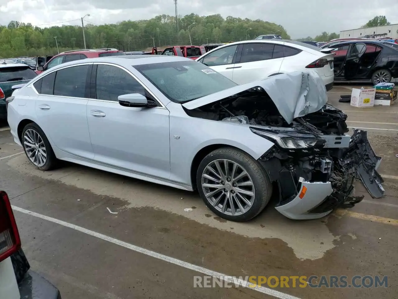 4 Photograph of a damaged car 1G6D15RW4N0120154 CADILLAC CT5 2022