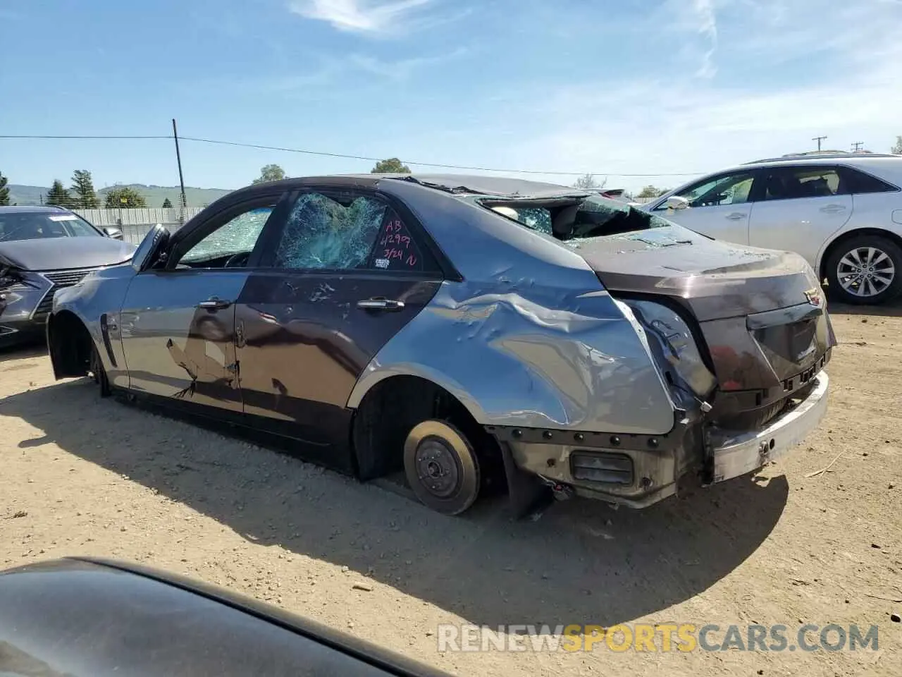 2 Photograph of a damaged car 1G6A15S63K0101555 CADILLAC CTS 2019
