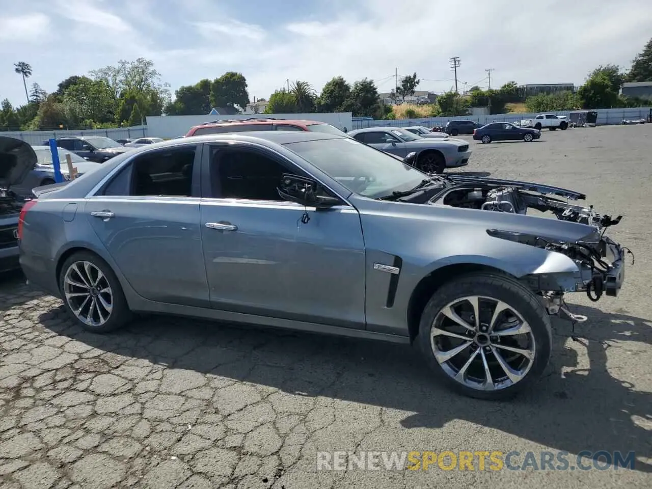 4 Photograph of a damaged car 1G6A15S6XK0100970 CADILLAC CTS 2019