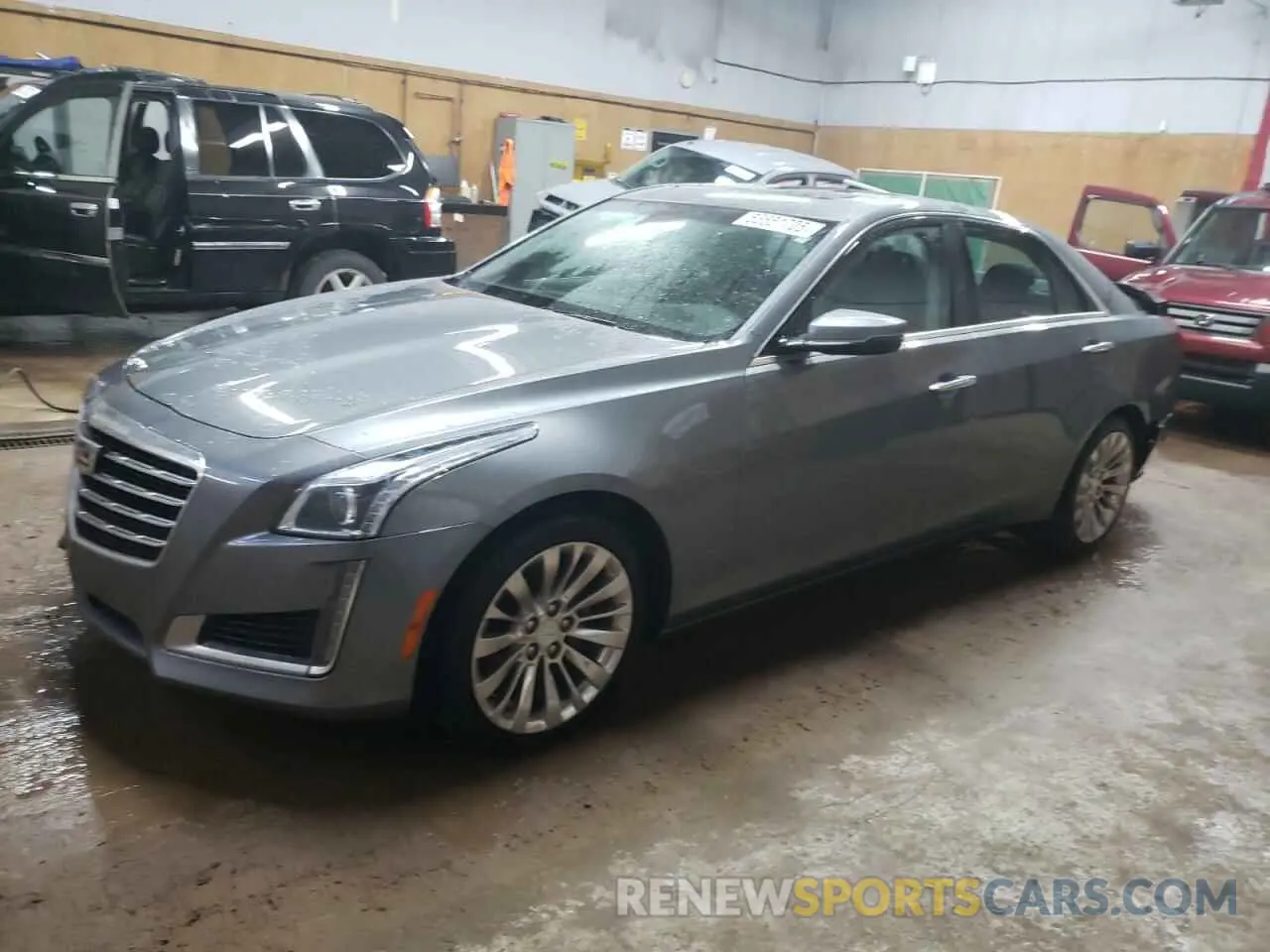 1 Photograph of a damaged car 1G6AX5SS5K0121561 CADILLAC CTS 2019