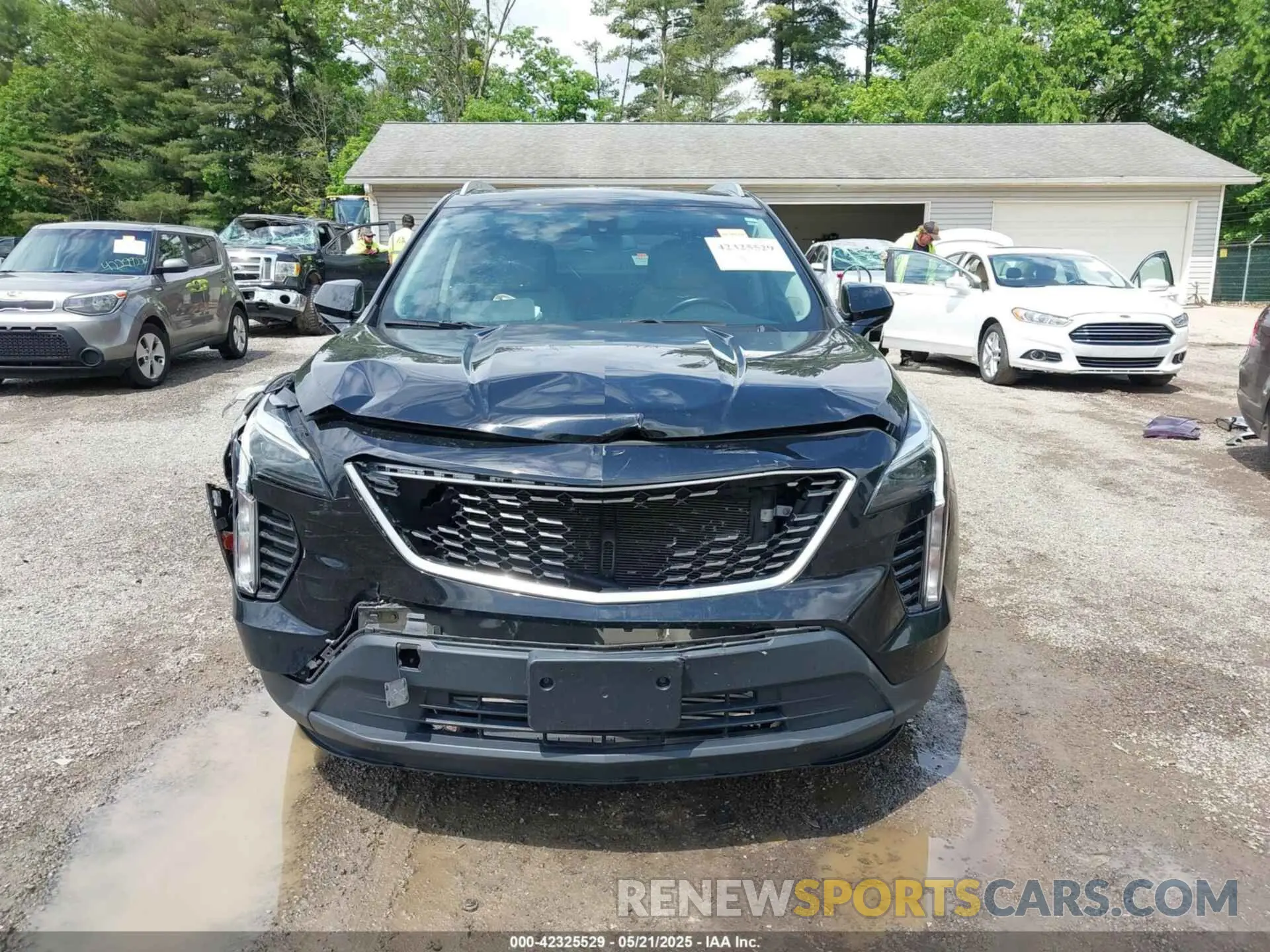 12 Photograph of a damaged car 1GYFZBR41KF150209 CADILLAC XT4 2019