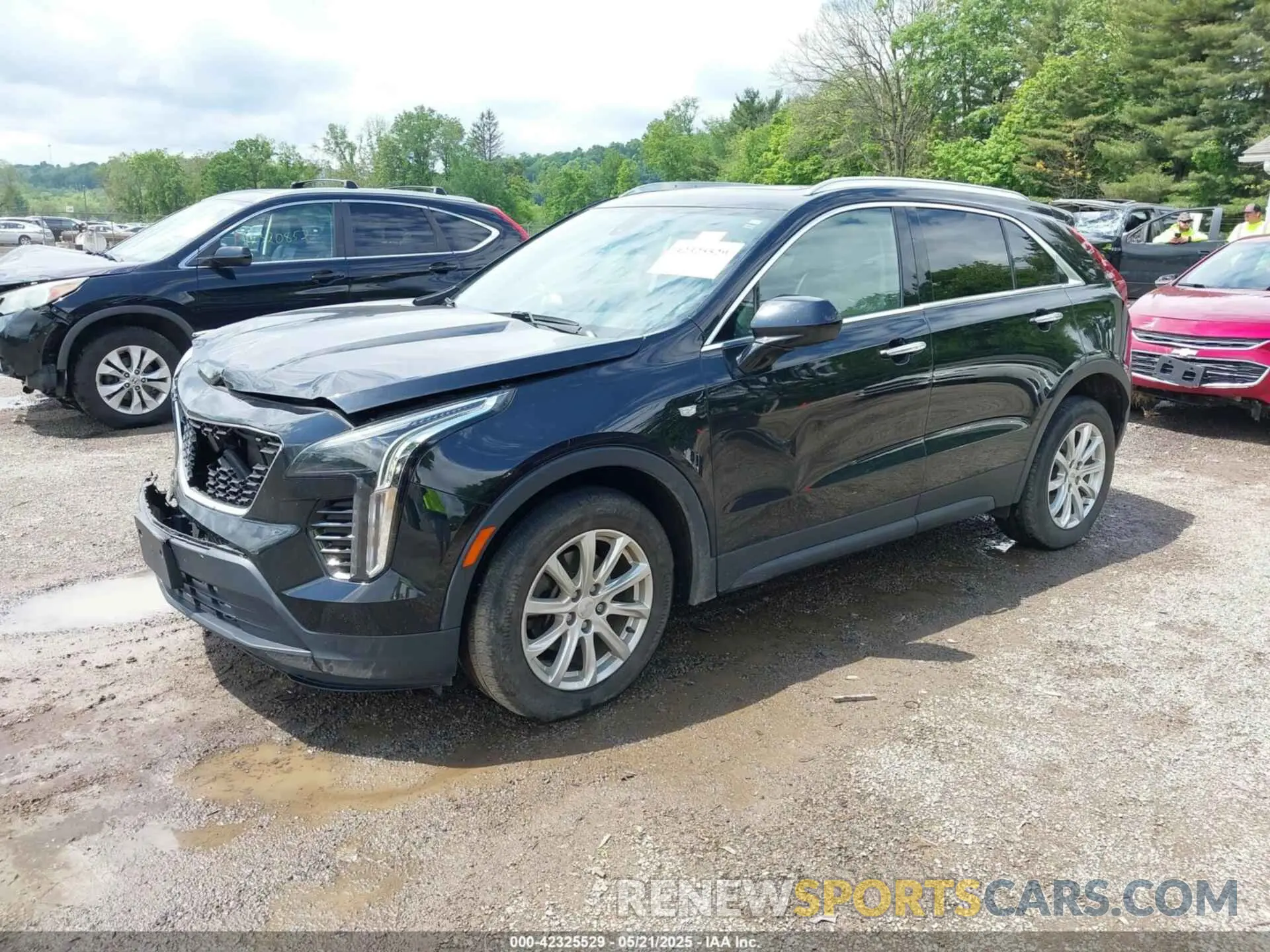 2 Photograph of a damaged car 1GYFZBR41KF150209 CADILLAC XT4 2019