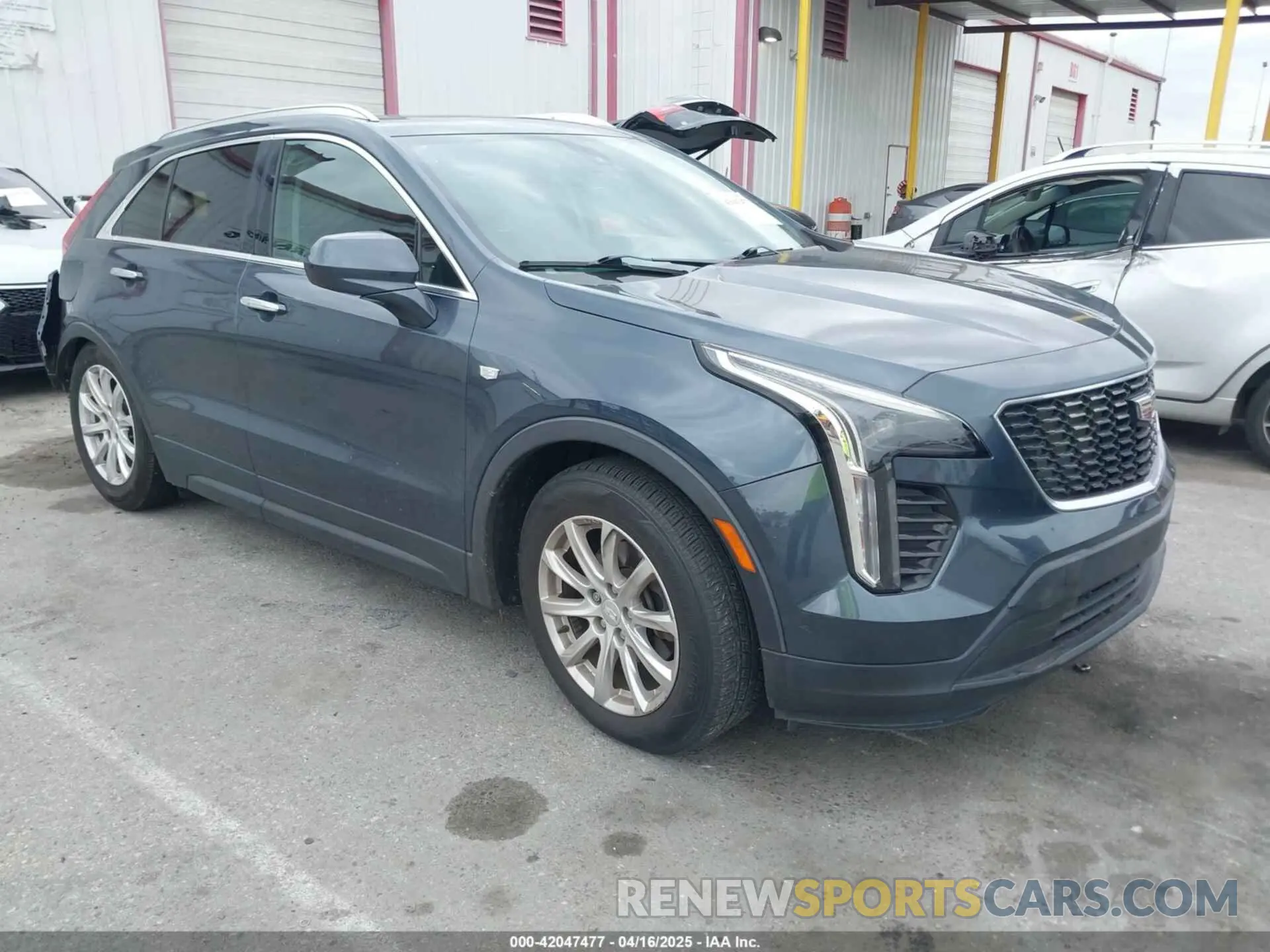 1 Photograph of a damaged car 1GYFZBR41KF160352 CADILLAC XT4 2019