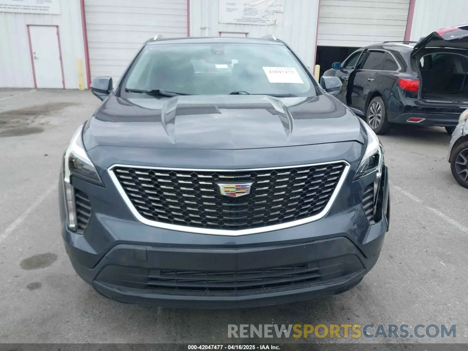 12 Photograph of a damaged car 1GYFZBR41KF160352 CADILLAC XT4 2019