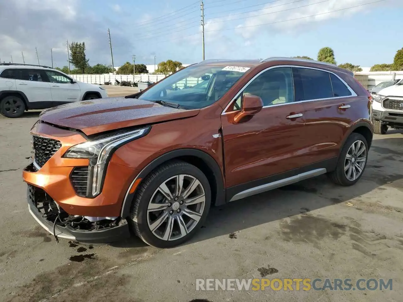 1 Photograph of a damaged car 1GYFZCR40KF180047 CADILLAC XT4 2019