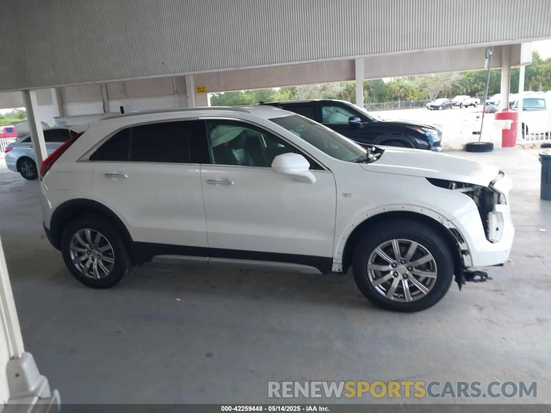 14 Photograph of a damaged car 1GYFZCR49KF142039 CADILLAC XT4 2019