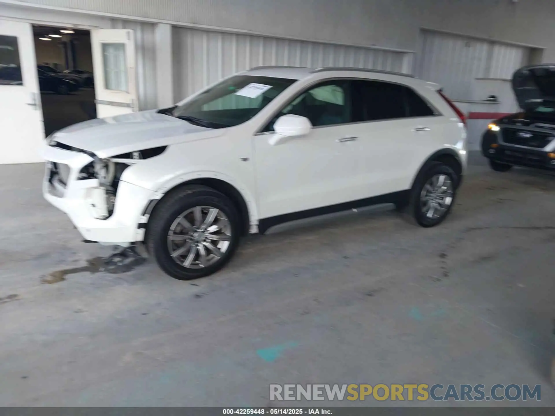 2 Photograph of a damaged car 1GYFZCR49KF142039 CADILLAC XT4 2019