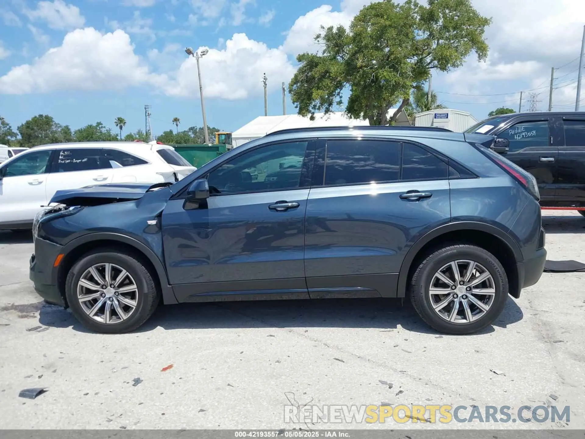 14 Photograph of a damaged car 1GYFZER42KF107032 CADILLAC XT4 2019