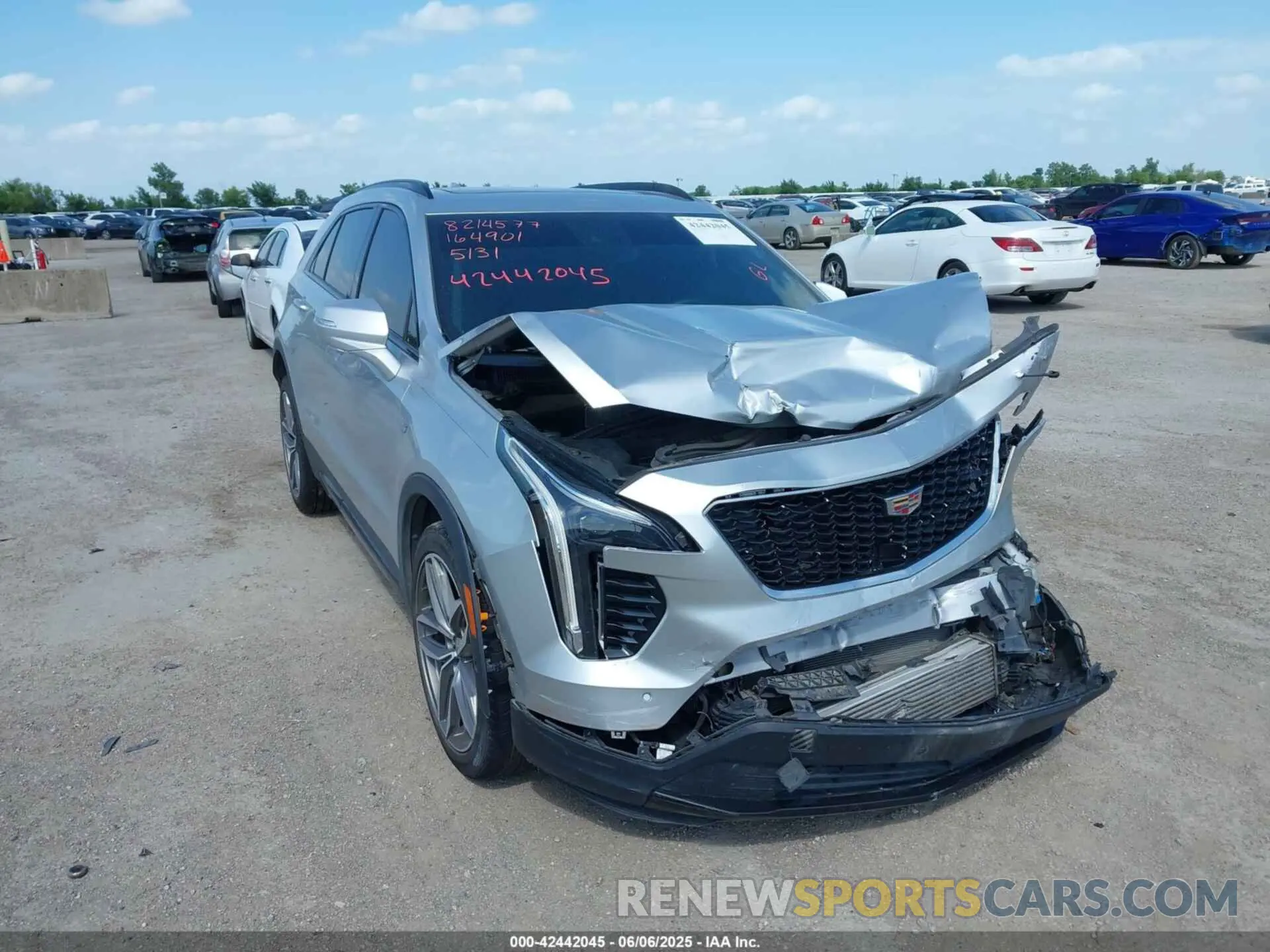 1 Photograph of a damaged car 1GYFZER44KF164901 CADILLAC XT4 2019