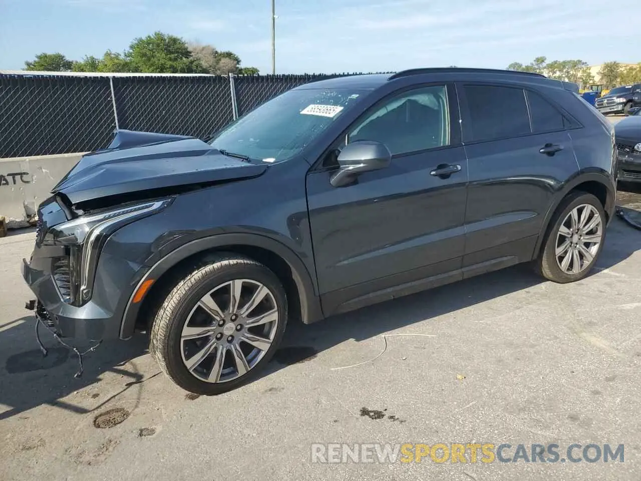1 Photograph of a damaged car 1GYFZER47KF103820 CADILLAC XT4 2019