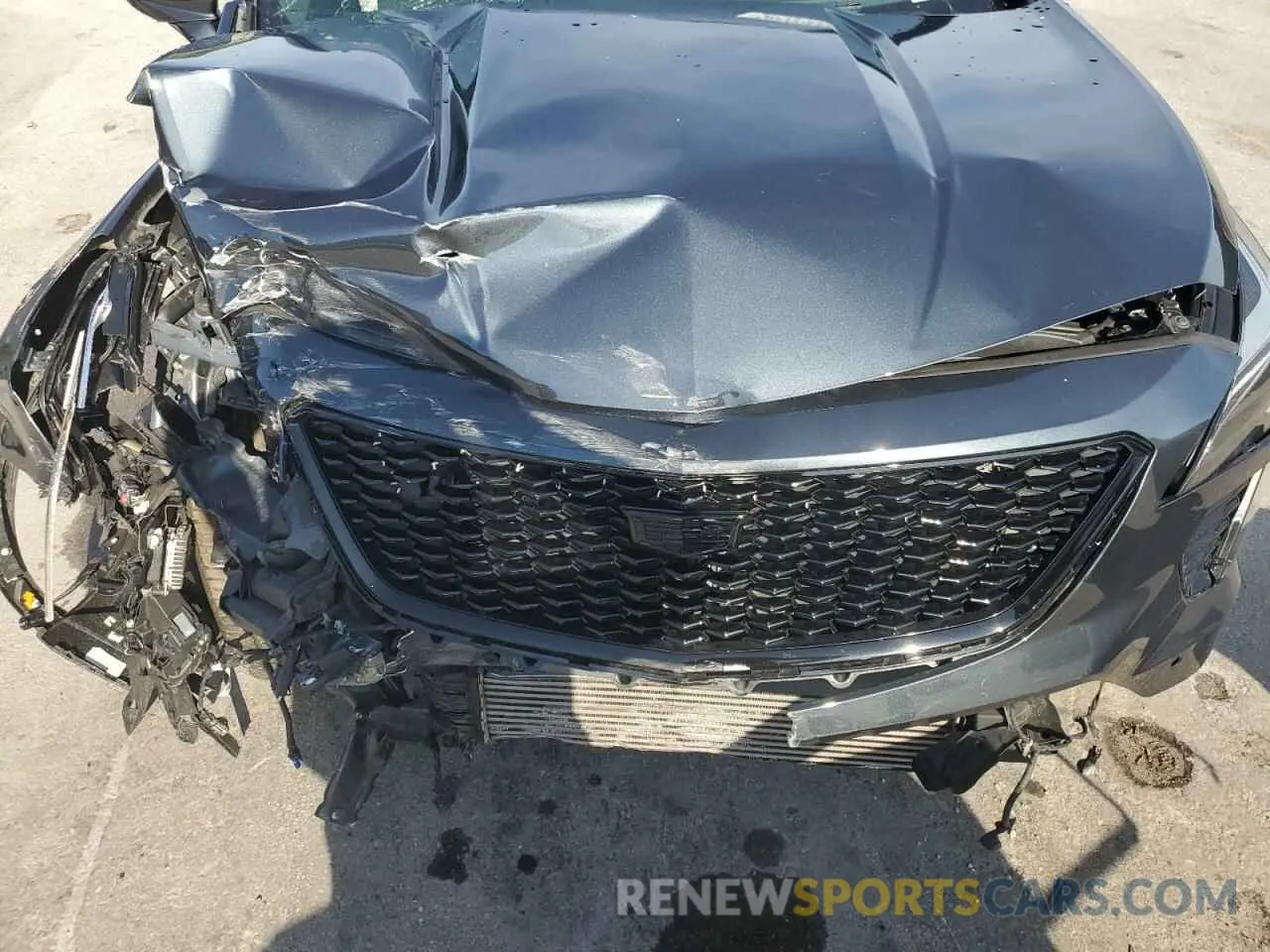 12 Photograph of a damaged car 1GYFZER47KF103820 CADILLAC XT4 2019