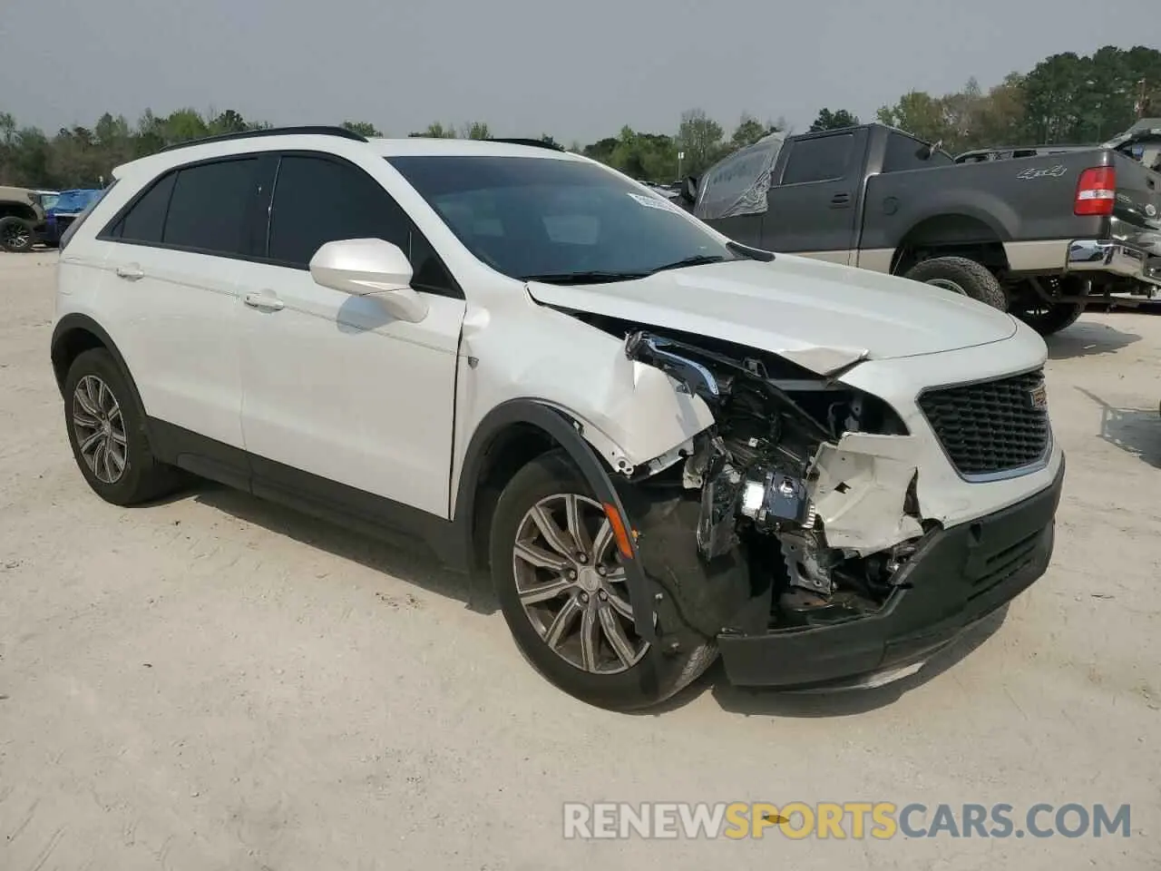 4 Photograph of a damaged car 1GYFZER47KF160325 CADILLAC XT4 2019
