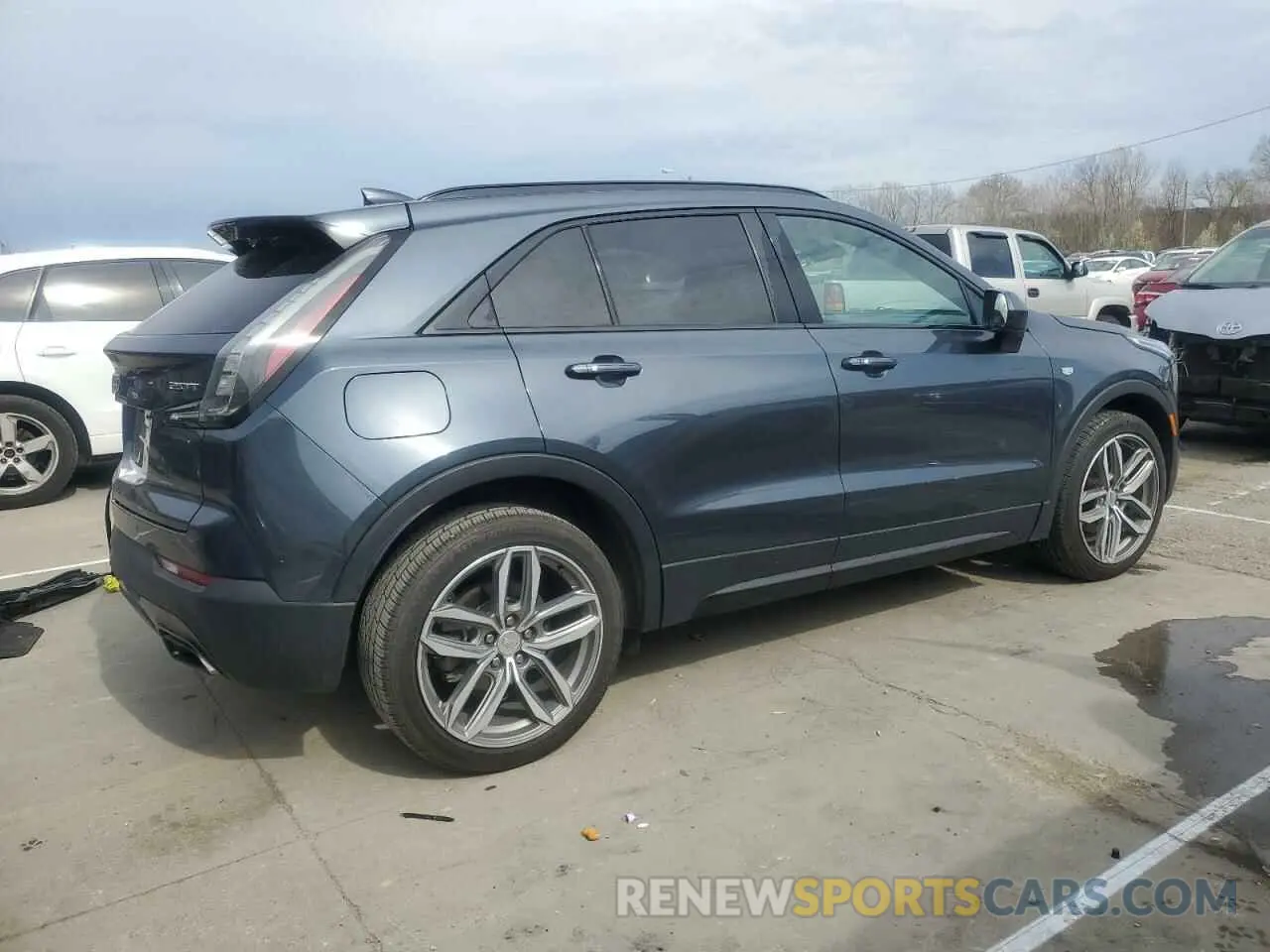 3 Photograph of a damaged car 1GYFZER49KF100661 CADILLAC XT4 2019