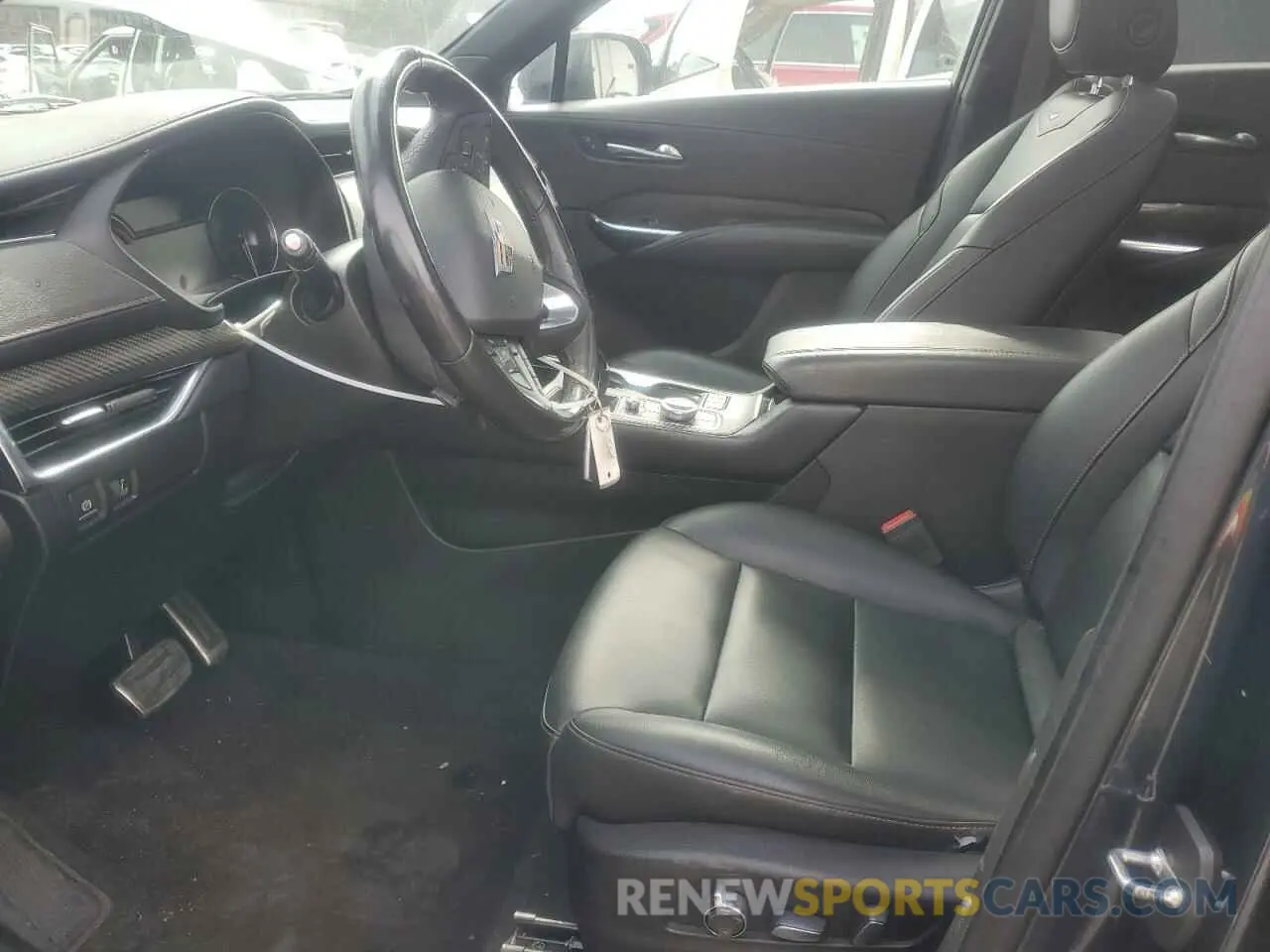 7 Photograph of a damaged car 1GYFZER49KF100661 CADILLAC XT4 2019