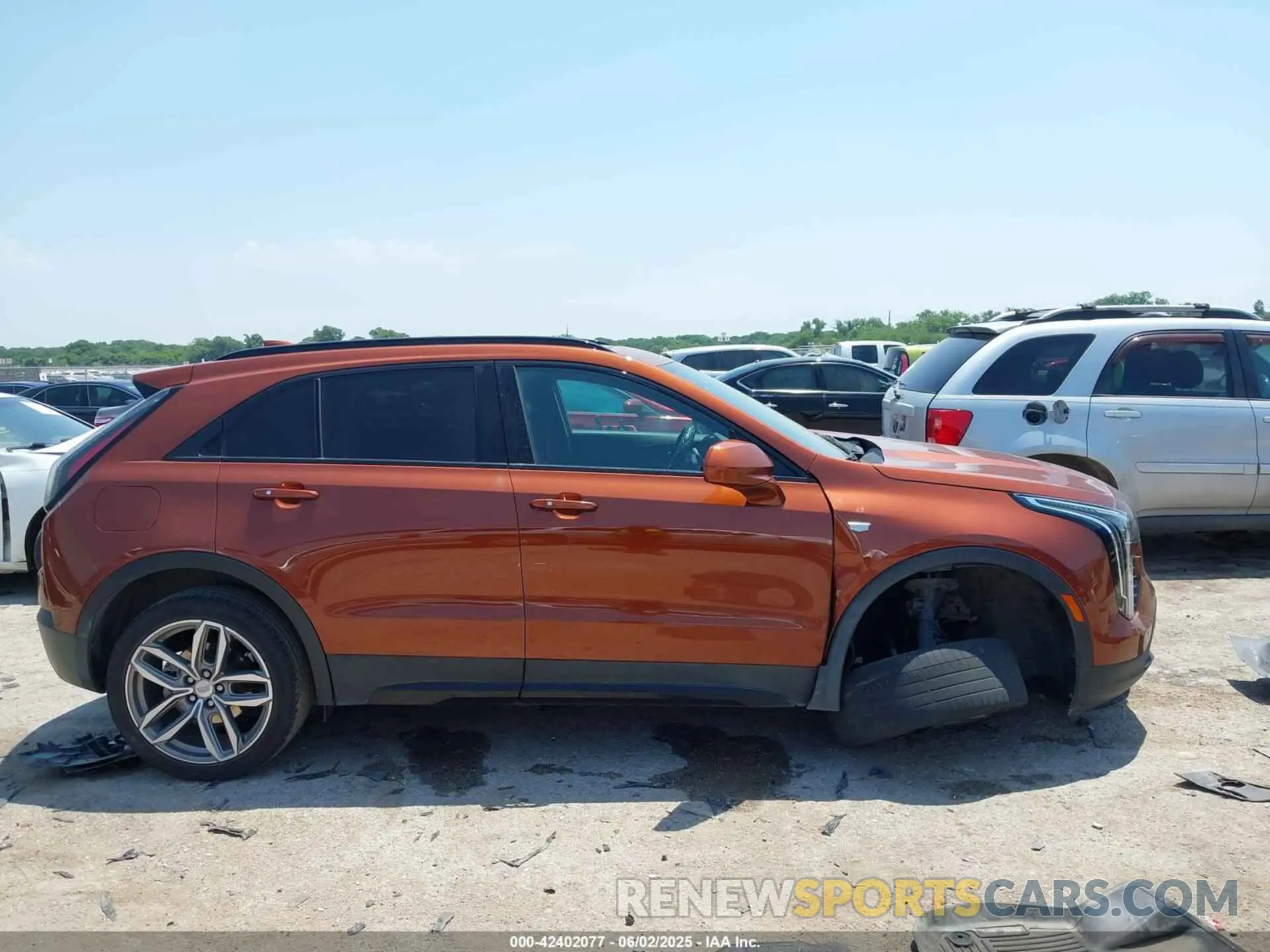 13 Photograph of a damaged car 1GYFZER4XKF103522 CADILLAC XT4 2019