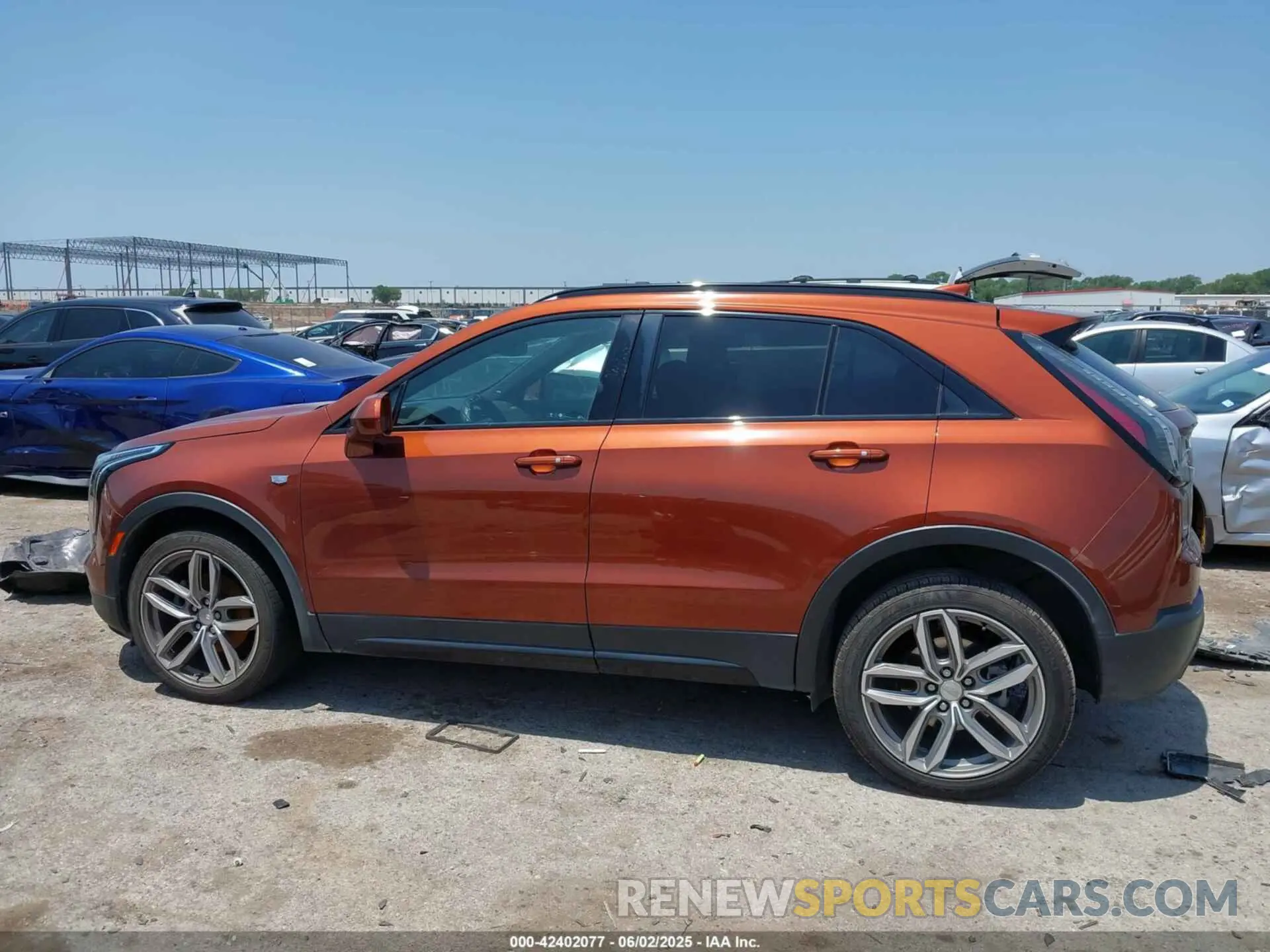 14 Photograph of a damaged car 1GYFZER4XKF103522 CADILLAC XT4 2019