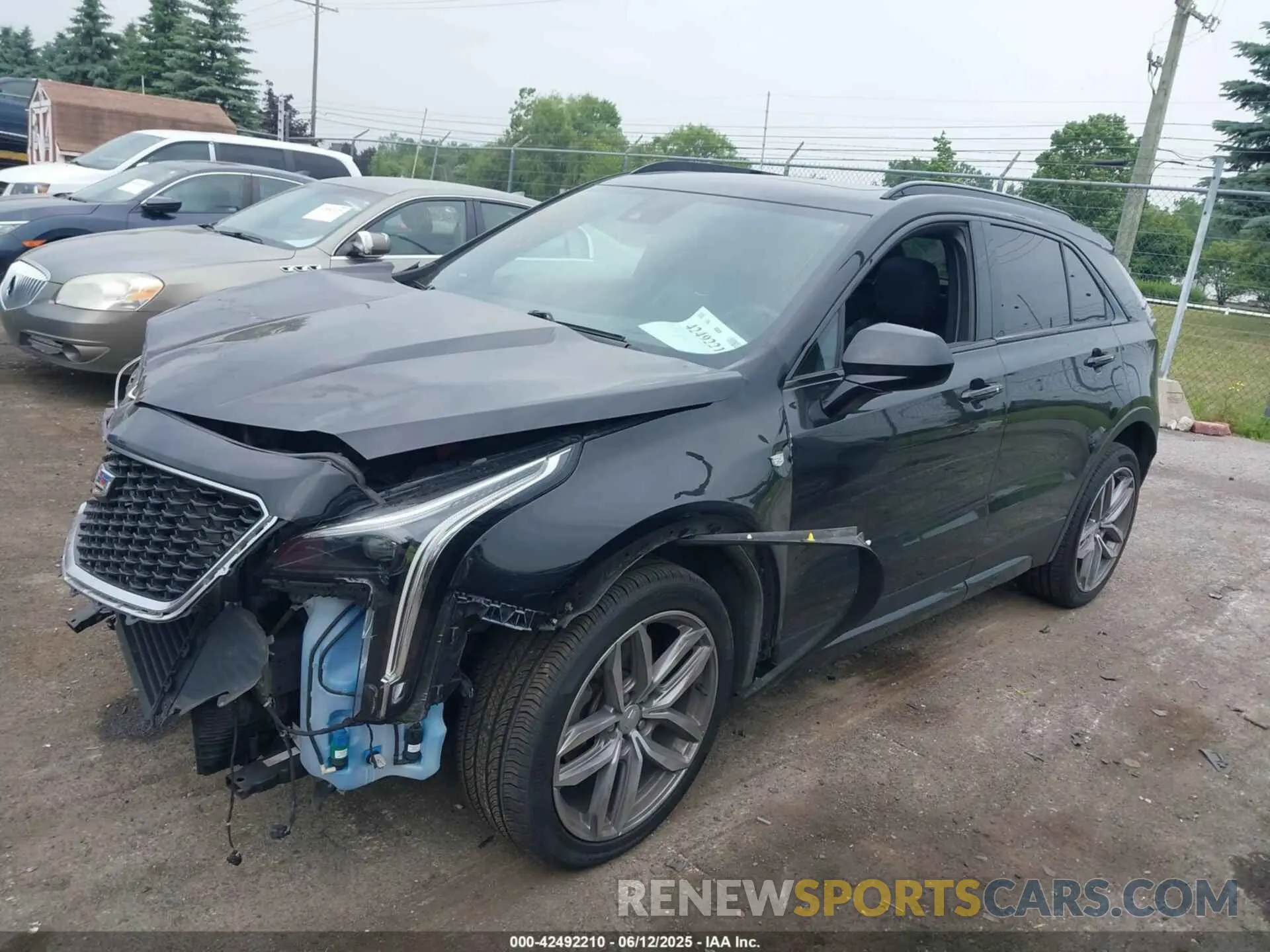 2 Photograph of a damaged car 1GYFZFR44KF150356 CADILLAC XT4 2019