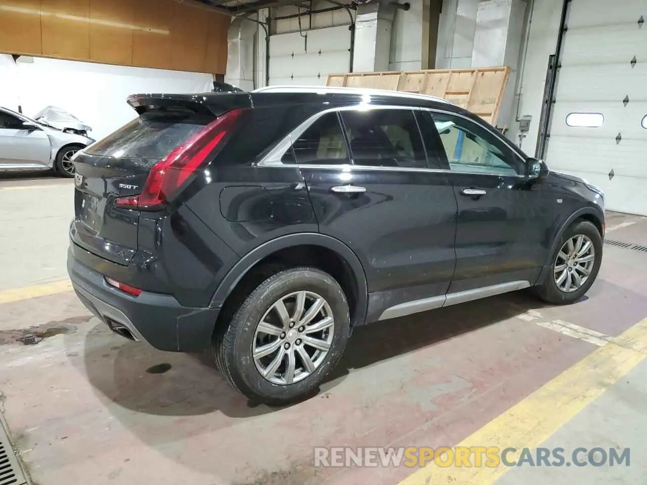 3 Photograph of a damaged car 1GYFZCR41LF064051 CADILLAC XT4 2020