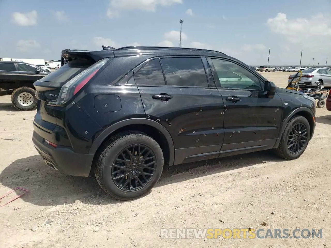 3 Photograph of a damaged car 1GYFZER43LF149811 CADILLAC XT4 2020