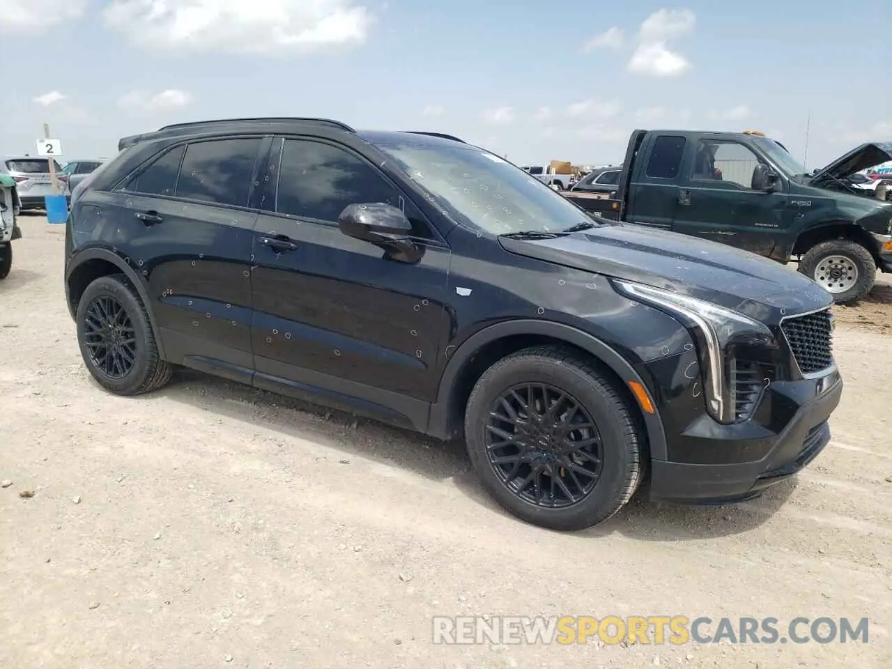 4 Photograph of a damaged car 1GYFZER43LF149811 CADILLAC XT4 2020