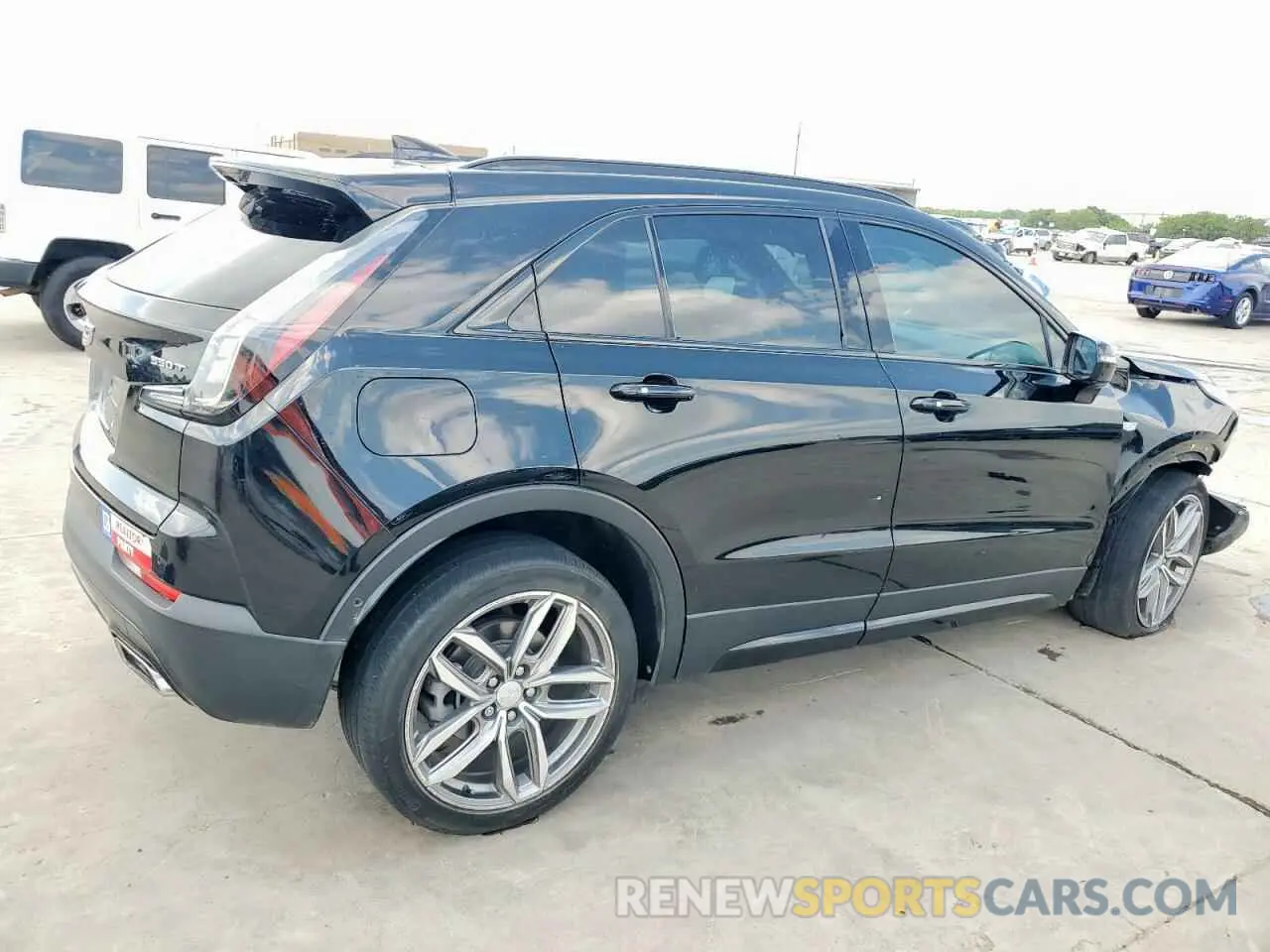 3 Photograph of a damaged car 1GYFZER47LF146488 CADILLAC XT4 2020