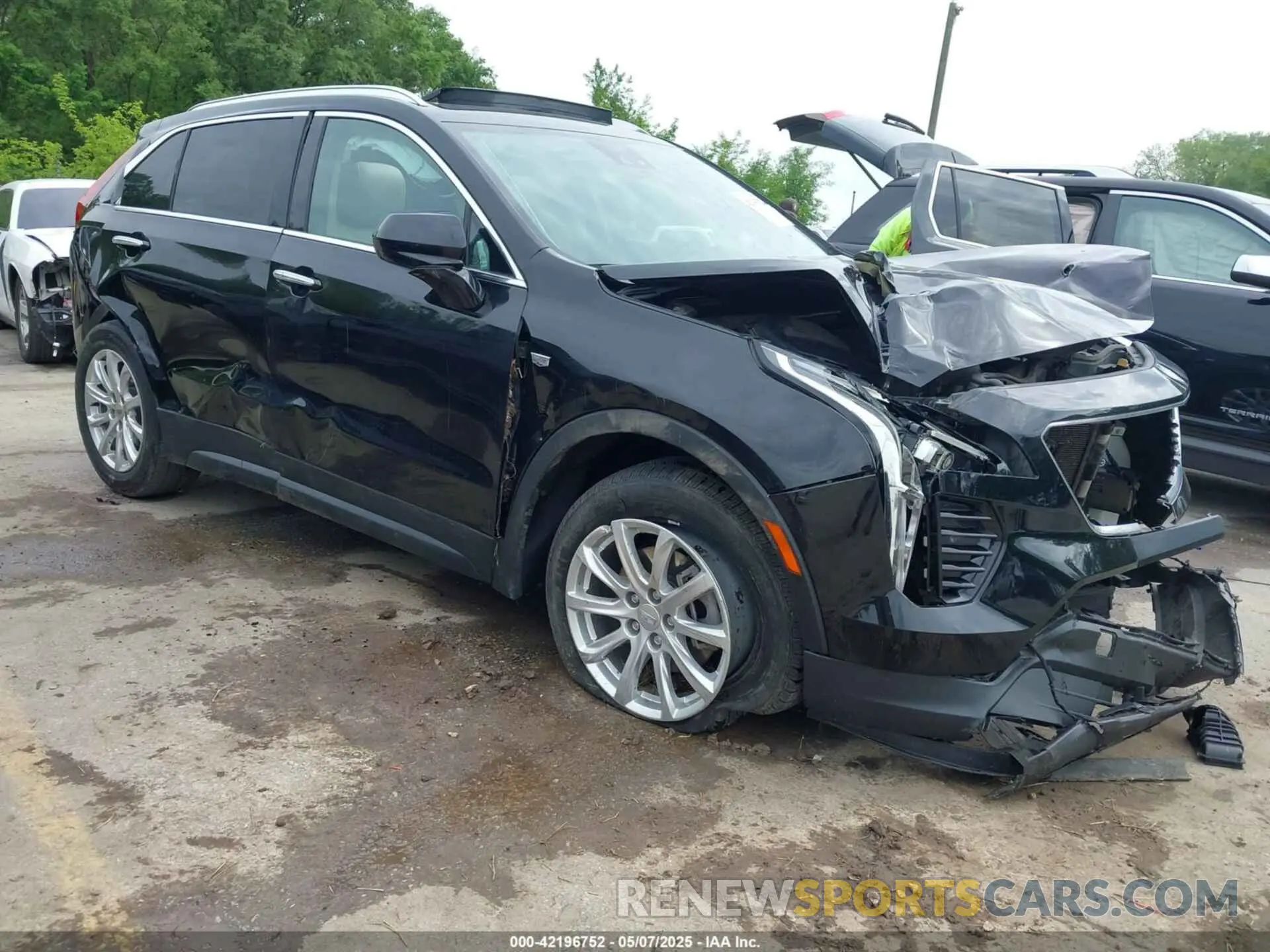 1 Photograph of a damaged car 1GYAZAR44MF004295 CADILLAC XT4 2021