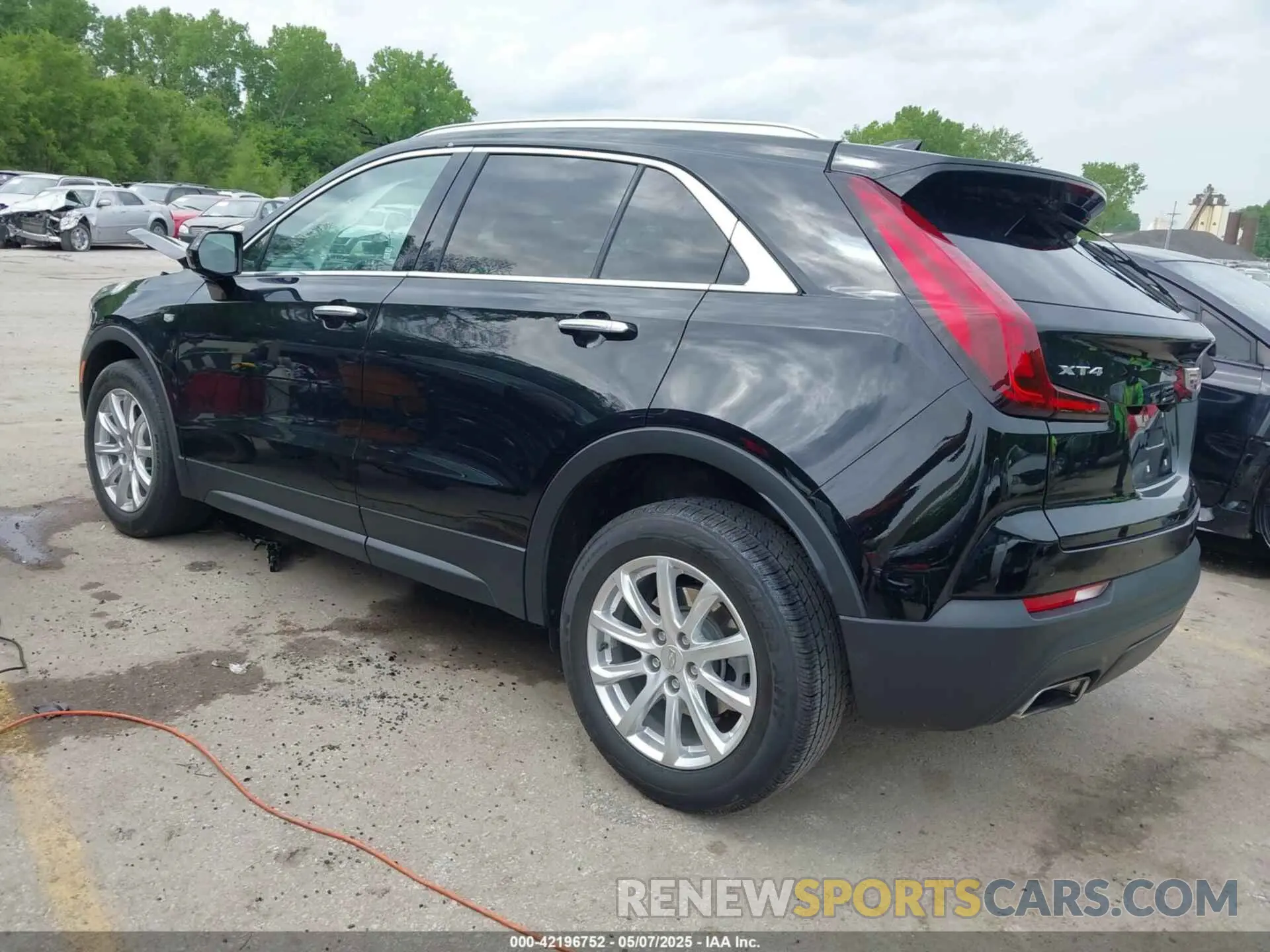 3 Photograph of a damaged car 1GYAZAR44MF004295 CADILLAC XT4 2021