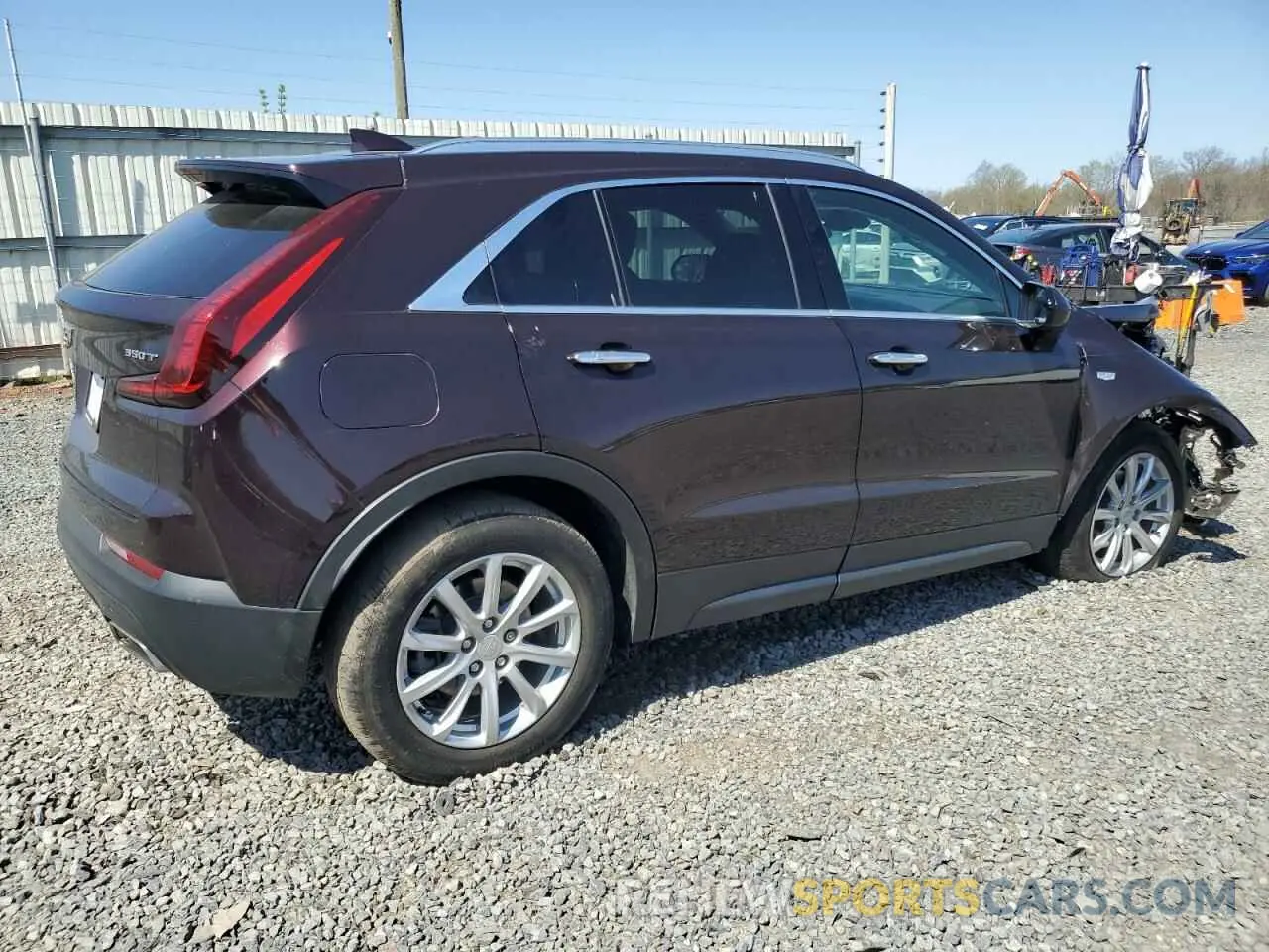 3 Photograph of a damaged car 1GYFZBR47MF022799 CADILLAC XT4 2021