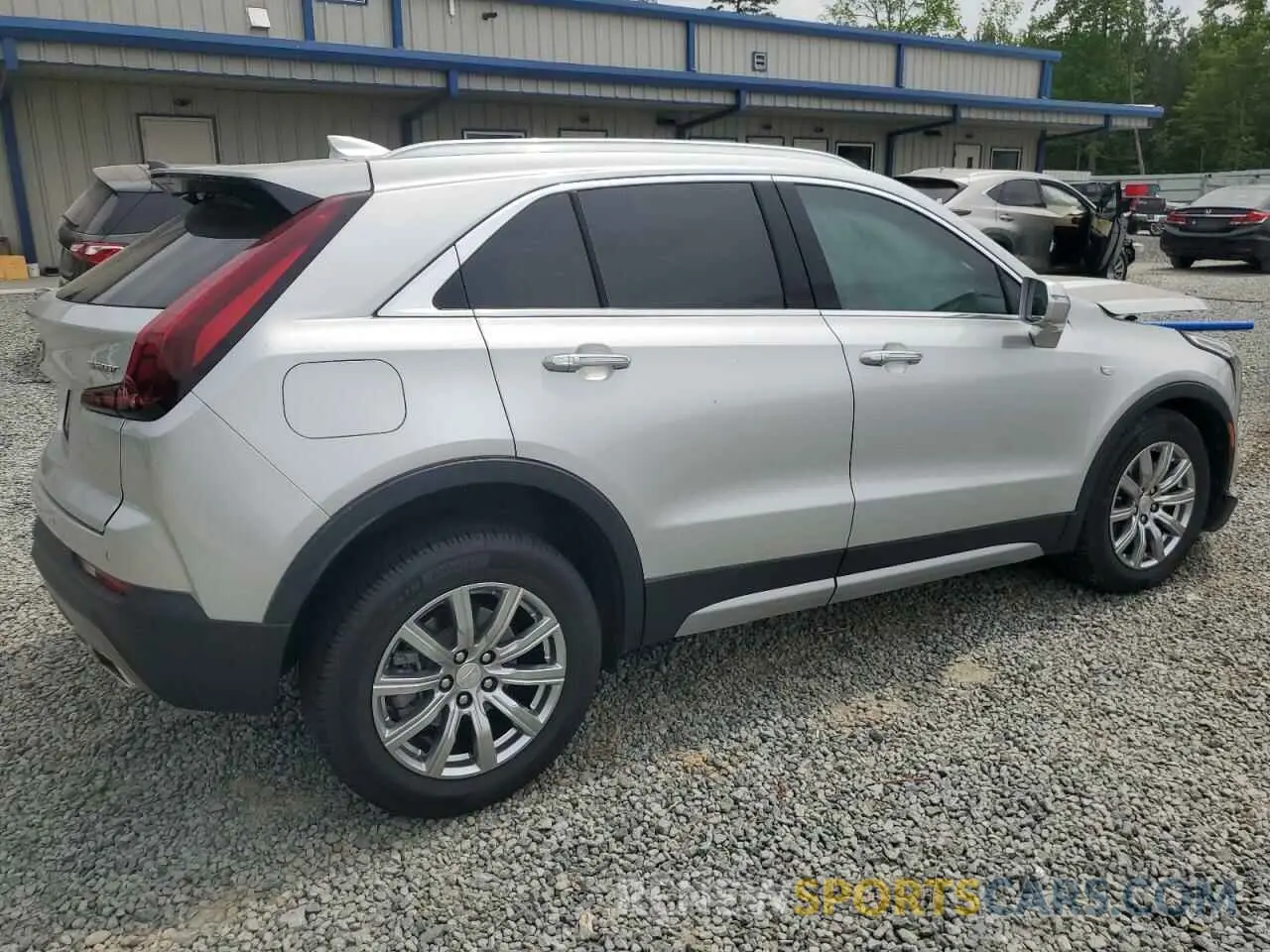 3 Photograph of a damaged car 1GYFZCR40MF000293 CADILLAC XT4 2021