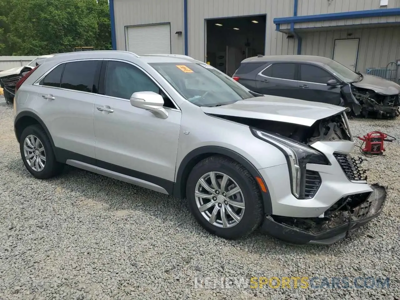 4 Photograph of a damaged car 1GYFZCR40MF000293 CADILLAC XT4 2021