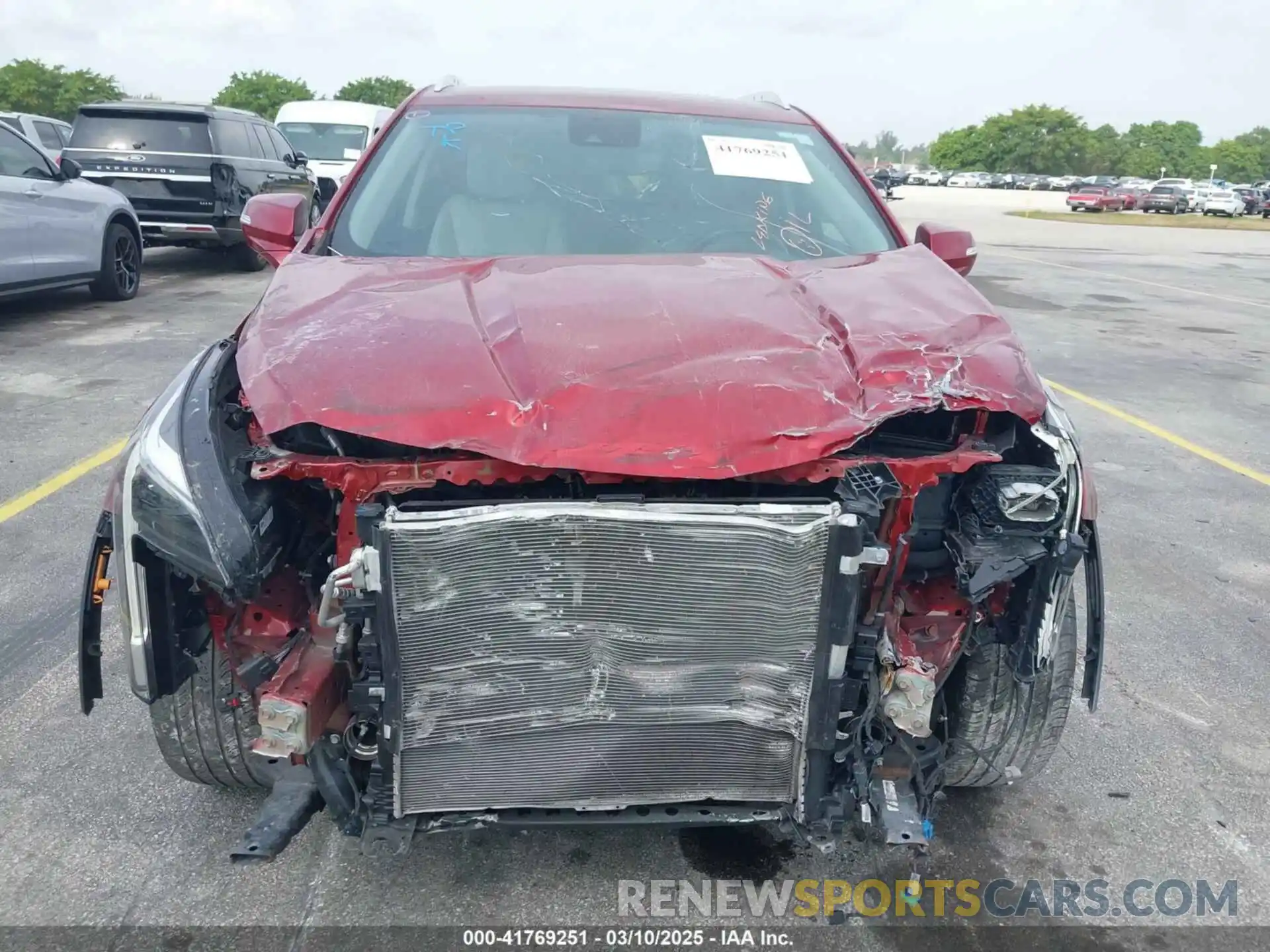 12 Photograph of a damaged car 1GYFZCR41MF043072 CADILLAC XT4 2021