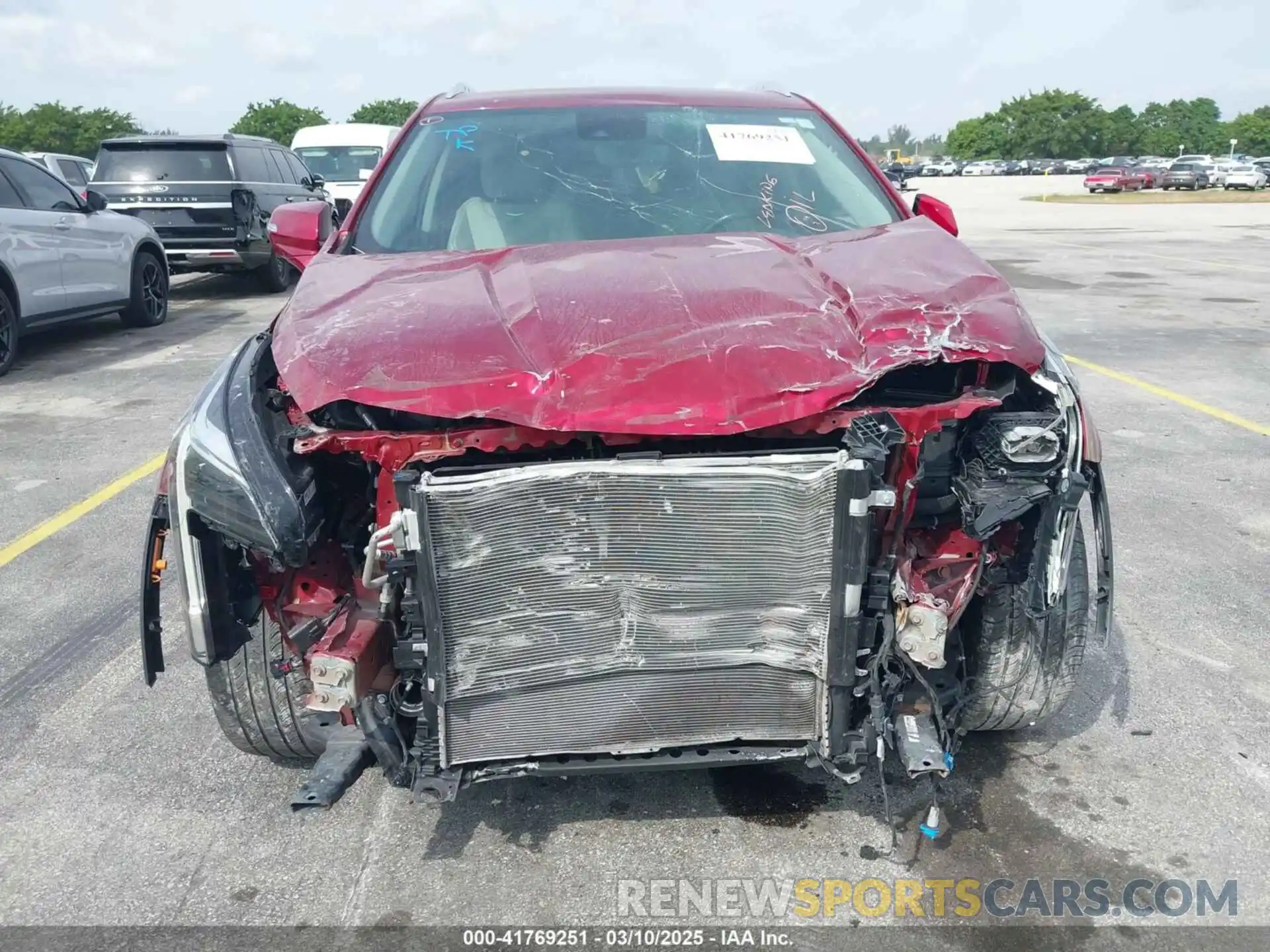 6 Photograph of a damaged car 1GYFZCR41MF043072 CADILLAC XT4 2021