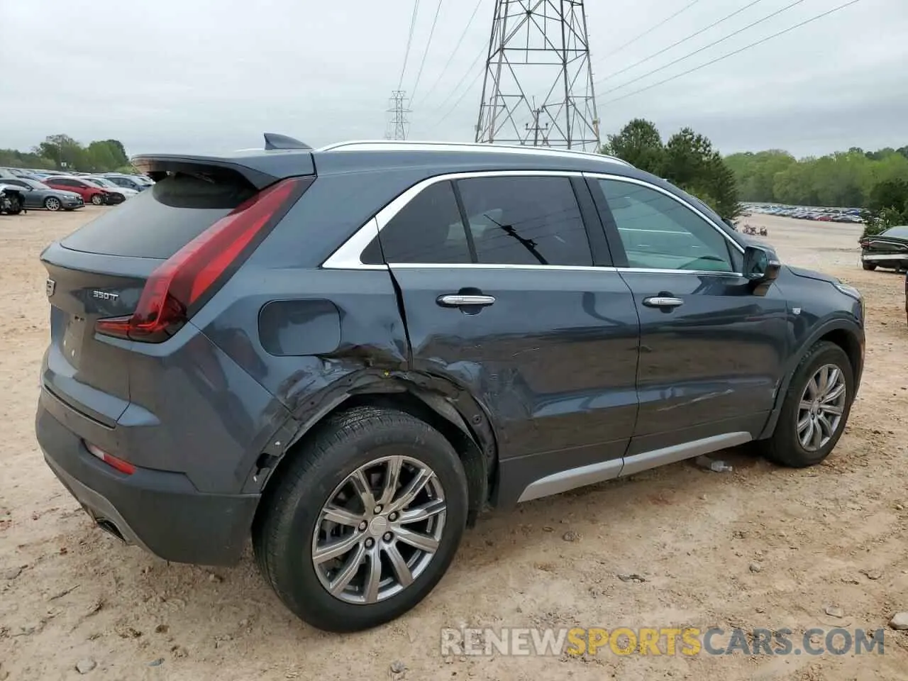 3 Photograph of a damaged car 1GYFZDR4XMF000937 CADILLAC XT4 2021