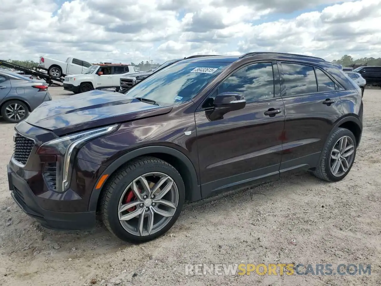 1 Photograph of a damaged car 1GYFZER43MF001188 CADILLAC XT4 2021